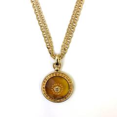 Gianni Versace 1990's gold tone medusa head pendant