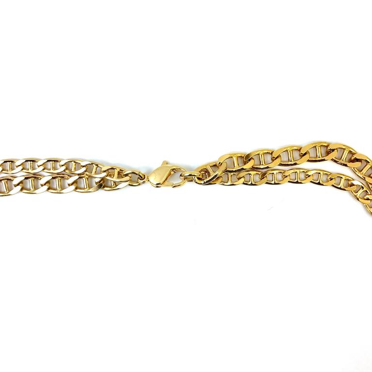 Gianni Versace 1990's gold tone medusa head pendant For Sale at 1stDibs