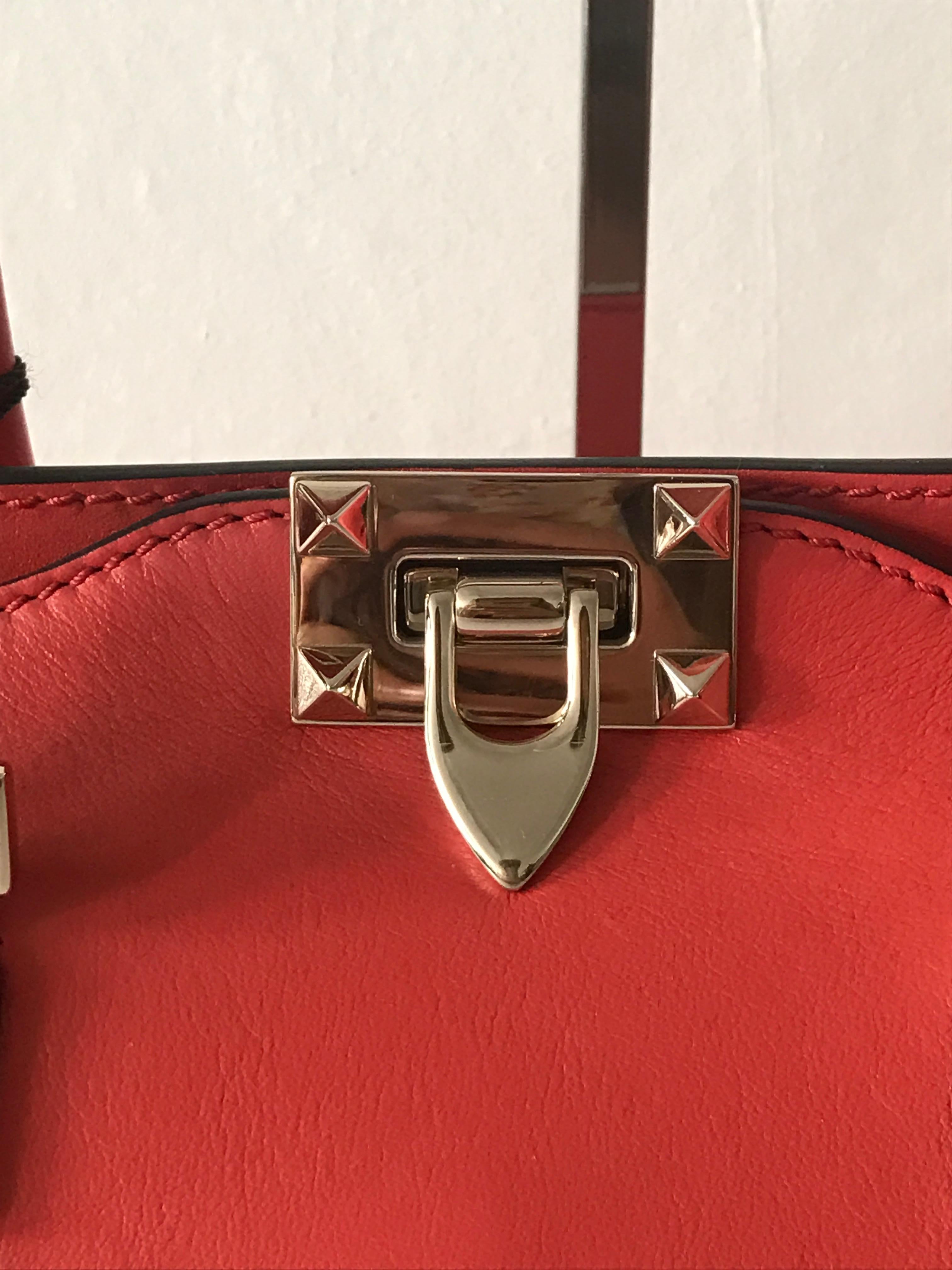 Valentino small rockstud leather handbag in cherry red  In New Condition In Nottingham, GB