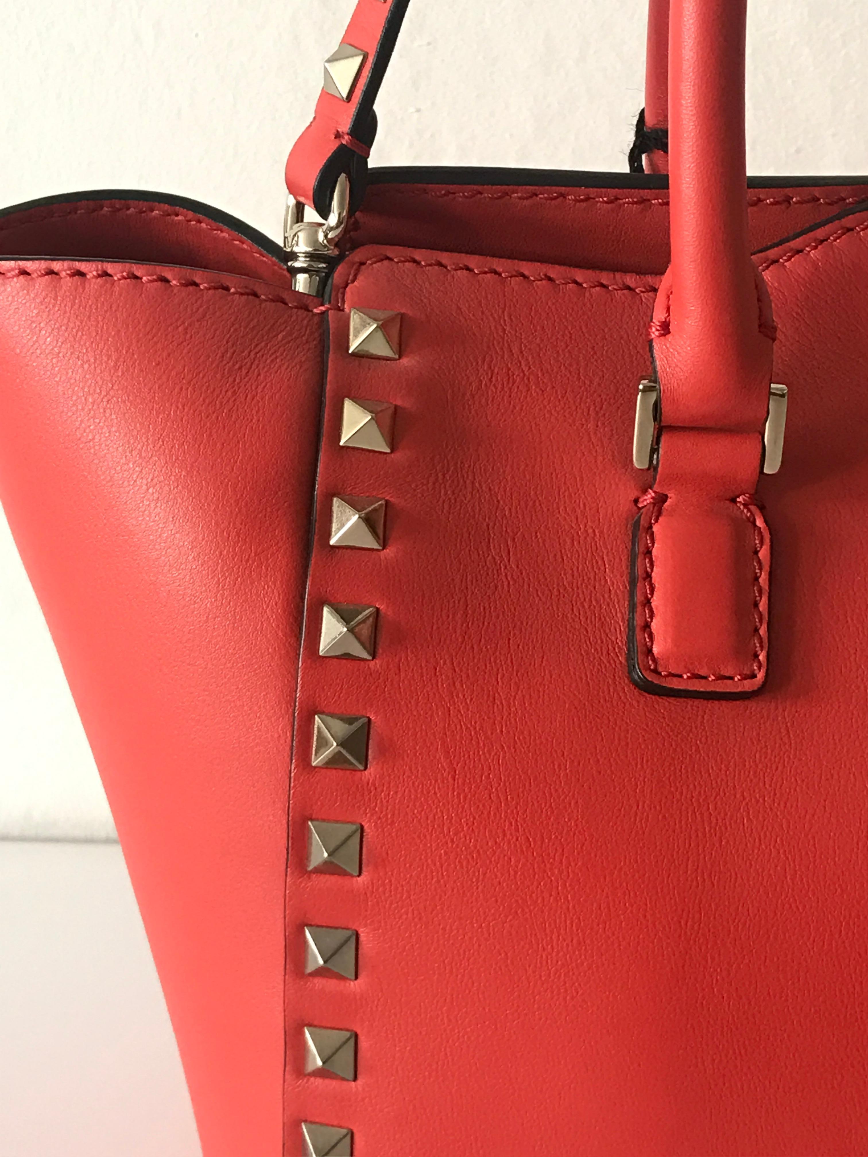Women's or Men's Valentino small rockstud leather handbag in cherry red 