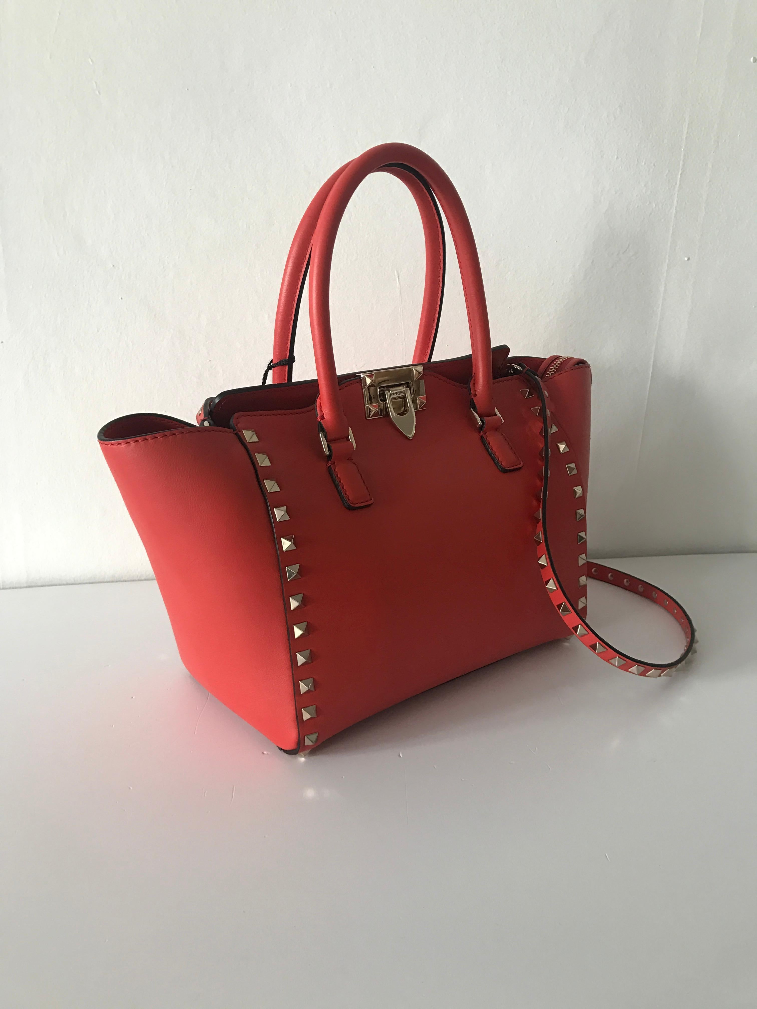 Valentino small rockstud leather handbag in cherry red  1
