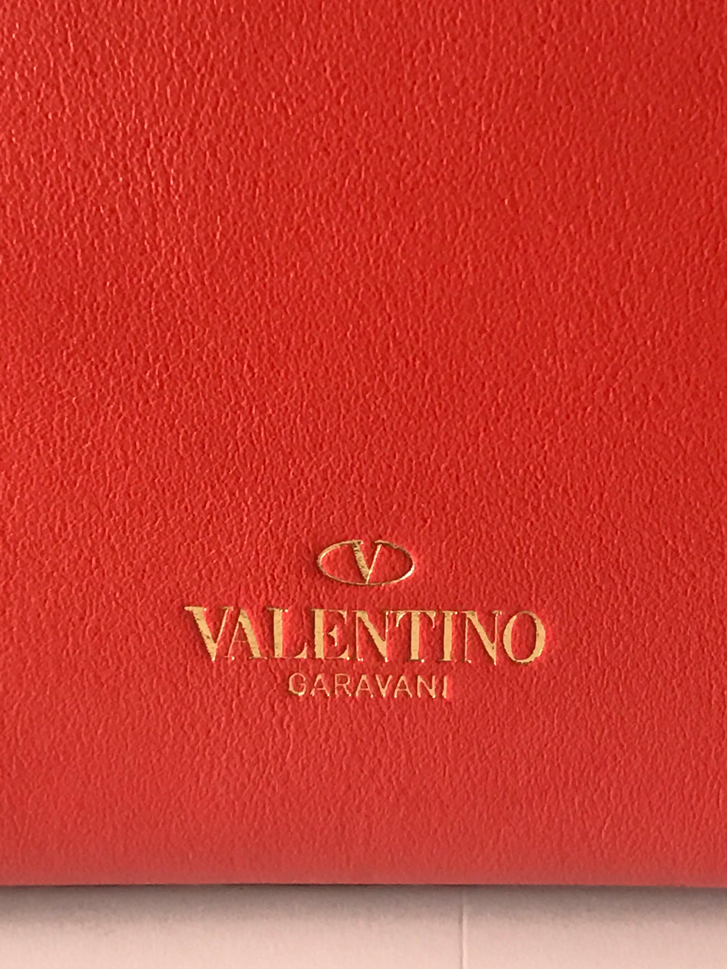 Valentino small rockstud leather handbag in cherry red  4