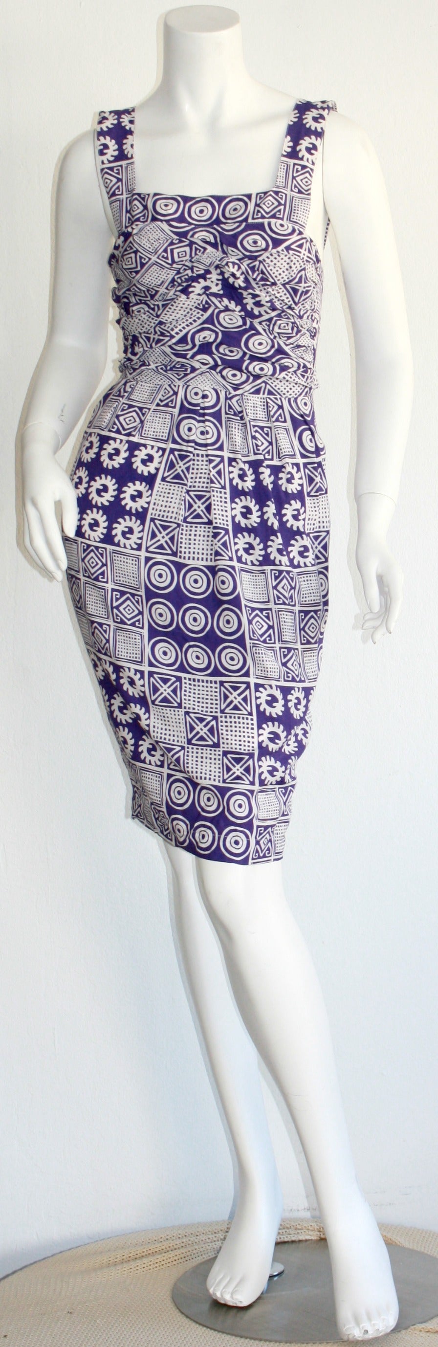 Phenomenal vintage Christian Lacroix purple tribal print dress! Sexy tie (open) back, to fit an array of bust sizes. Beautiful fit, with an impressive print! 100% Rayon. In great condition--Never Worn. Approximately Size Small