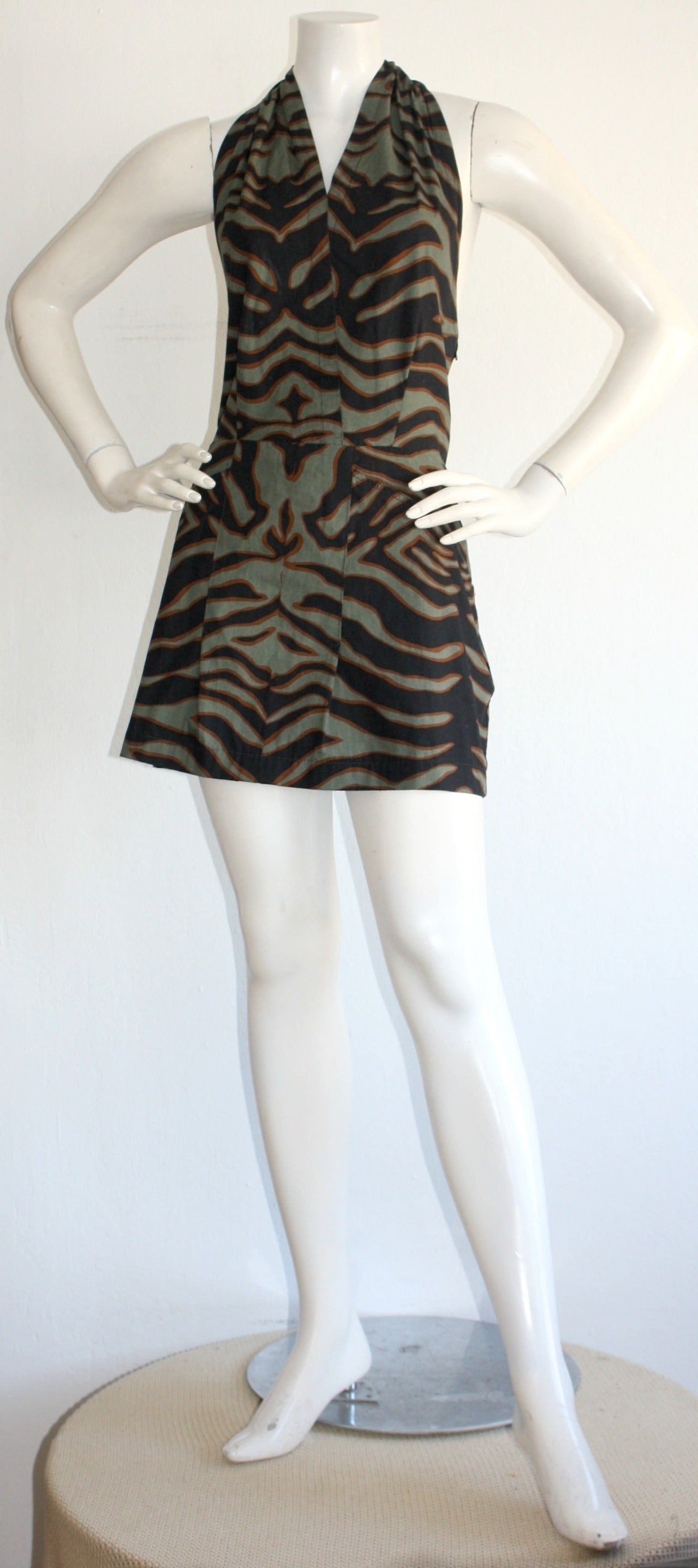 Extremely Rare vintage YSL Rive Gauche cotton safari tie halter neck dress! Features an incredible, Avant Garde zebra print, that form two zebra body motifs at waist. Ultra important piece, with so much fashion history. Easily transitions from day