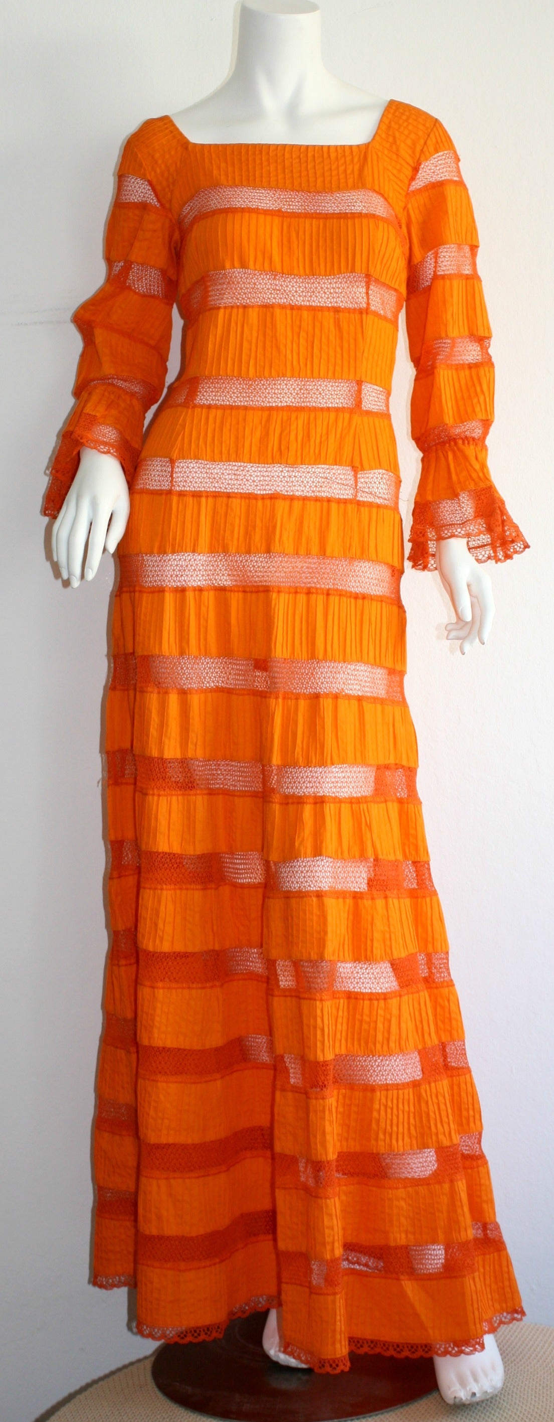 A superb vintage Tachi Castillo bright orange maxi dress! Horizontal cotton panels, with cotton crochet horizontal panels throughout. Great alone, or over a swimsuit!  100% Cotton. In great condition. Approximately Size