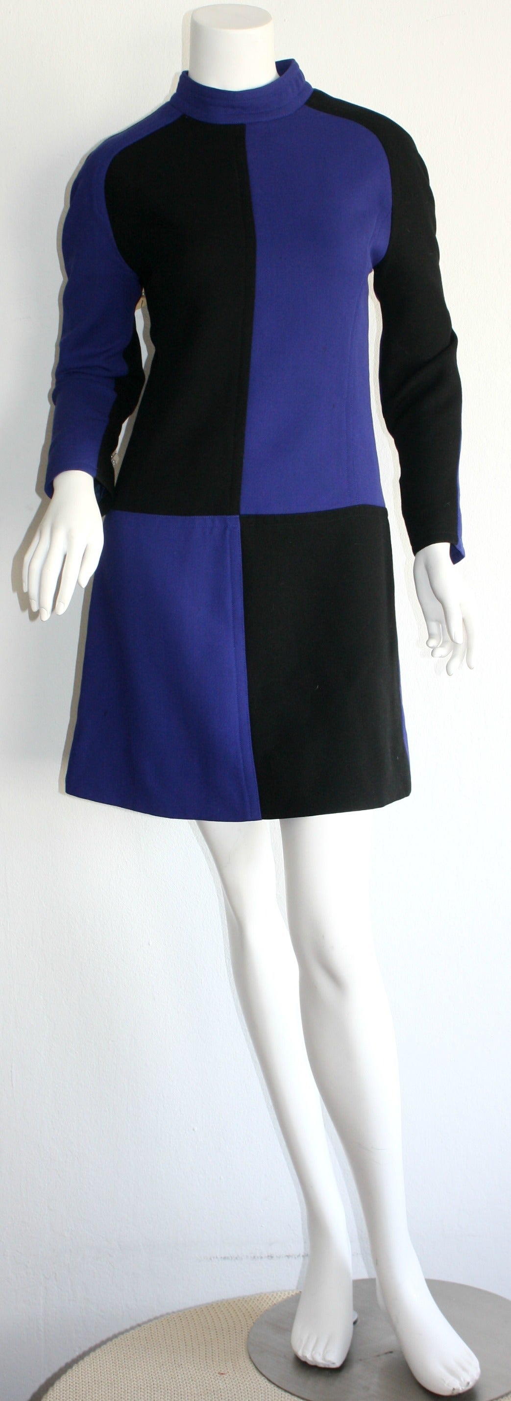 Make the perfect statement in this collectible Andre Courreges dress!!! Mr. Courreges just passed away this past week, so I am highlighting some of his iconic pieces from my collection. This dress is of museum quality, but is also worthy of any