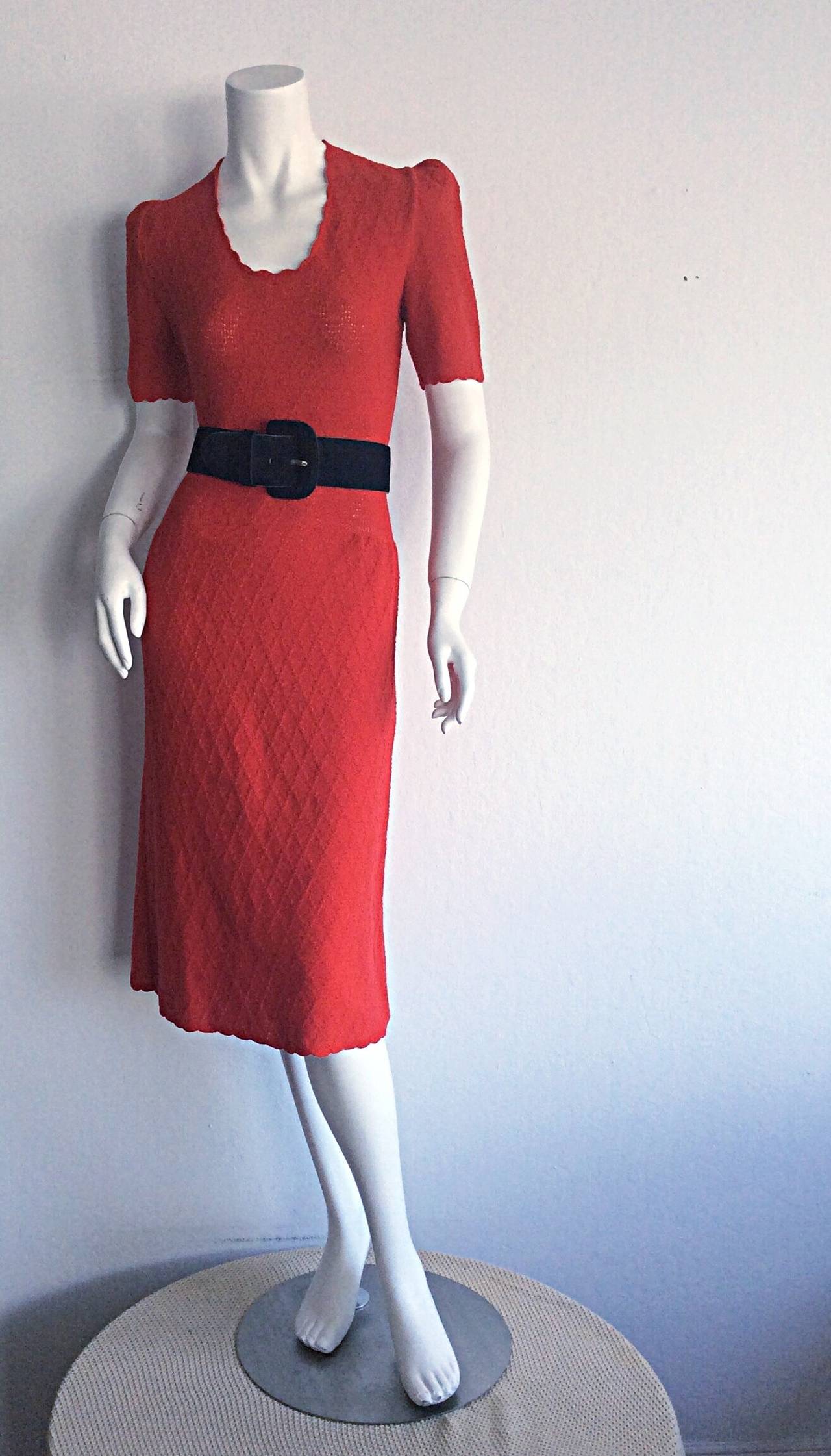 Adorable vintage Adolfo for Saks 5th Avenue lipstick red knit dress. Signature Adolfo knit, with quite a bit of stretch. Chic puff sleeves, with a flattering Babydoll fit, and full skirt. Lettuce edging. Perfect from day to night. Looks great alone,
