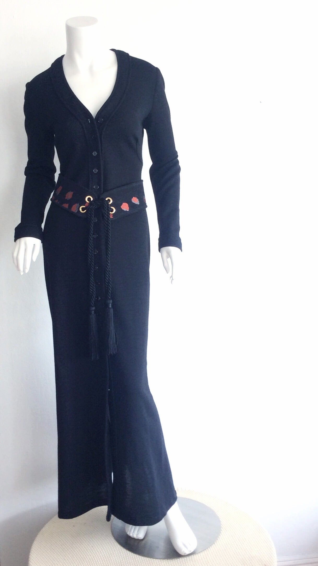 Beautiful vintage Mary Quant for Bonwit Teller black wool shirt dress! Features buttons up the entire front, which makes for an incredible figure flattering dress, or cardigan. A truly versatile piece that can be worn in so many ways. Mary Quant