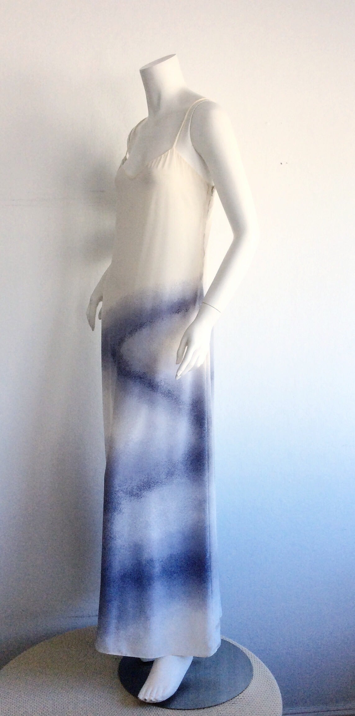 Ultra rare 1970s vintage Halston silk ivory dress, with blue ombré effect. Documented dress, with the figure flattering cut Halston was famous for. Bears the original Halston label, along with Neiman Marcus label. Never worn, in great condition.