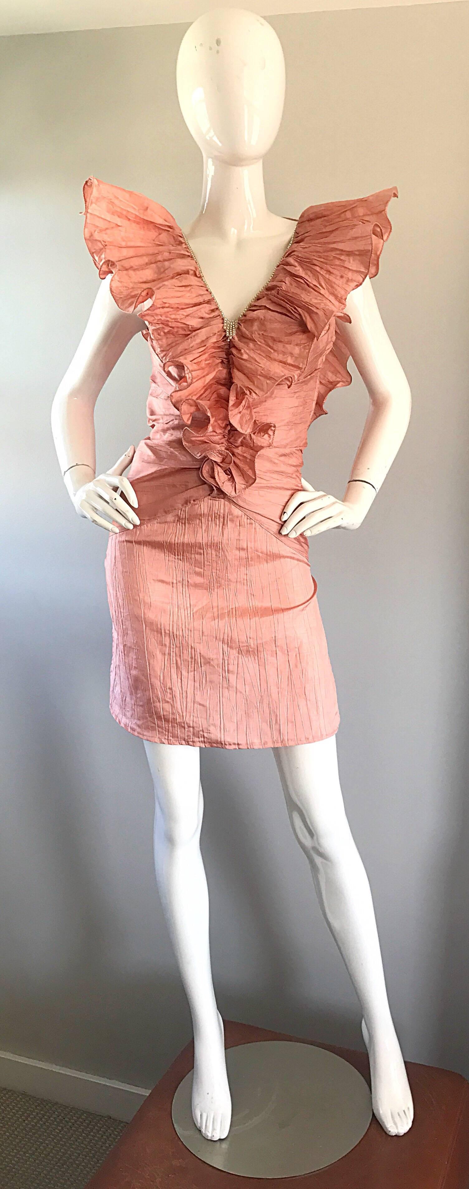 Incredible vintage 1980s AVANT GARDE ruffles and rhinestones sleeveless mini cocktail dress! If this isn't a statement making dress, then I don't know what is! Beautiful pink color is great all year. Ruffles on the front mirror the ones on the low