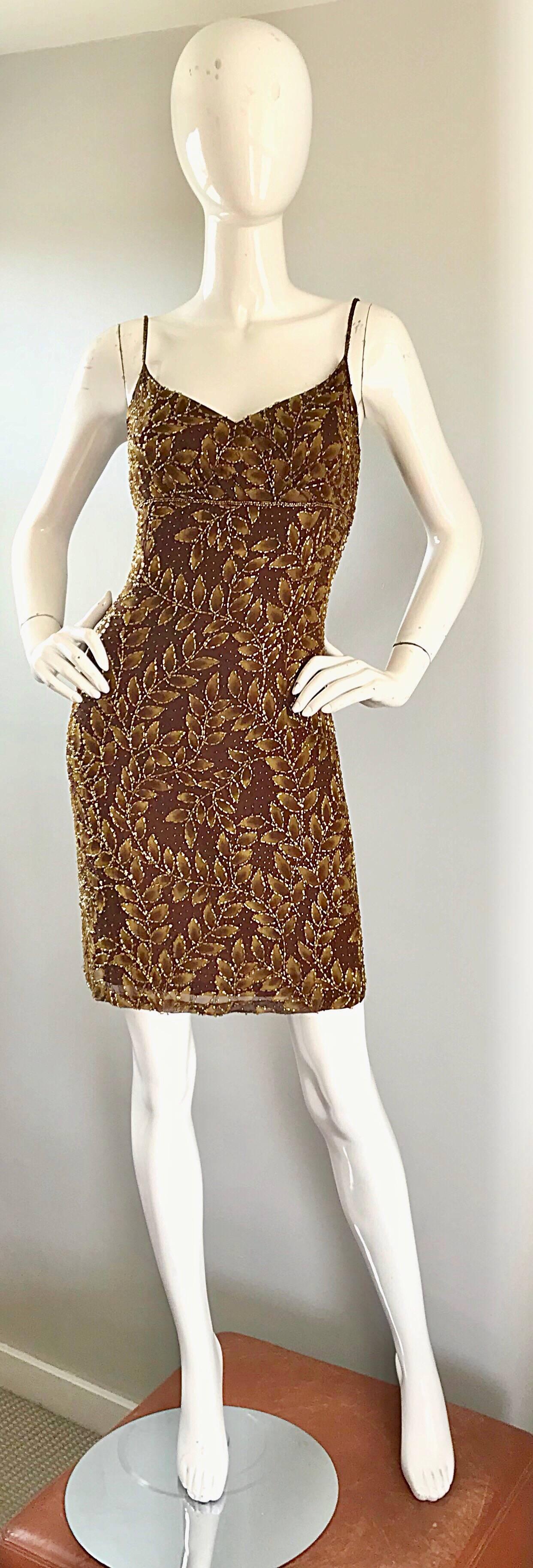 Beautiful vintage OLEG CASSINI brown, gold and bronze sleeveless silk beaded 'leaf' print cocktail dress! Features thousands of gold beads throughout. Hidden zipper up the back with hook-and-eye closure. Fully lined. Very flattering fit. Great