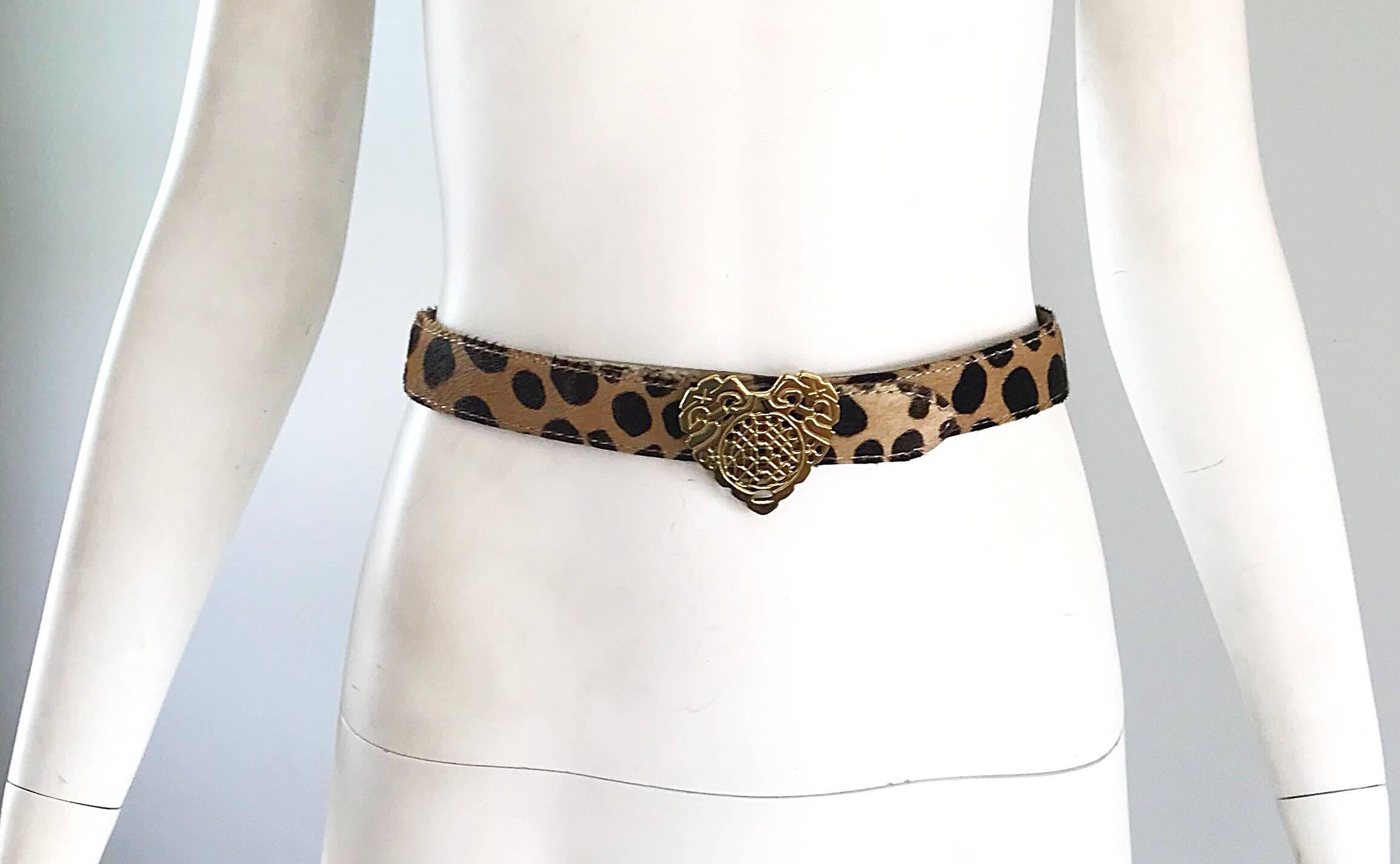Wonderful vintage MOSCHINO 'CHEAP AND CHIC' pony hair leopard / cheetah print belt! Features soft genuine calf hair, with a gold heart shaped buckle. Great with jeans, a skirt, shorts, or over a dress. In greate condition. Made in
