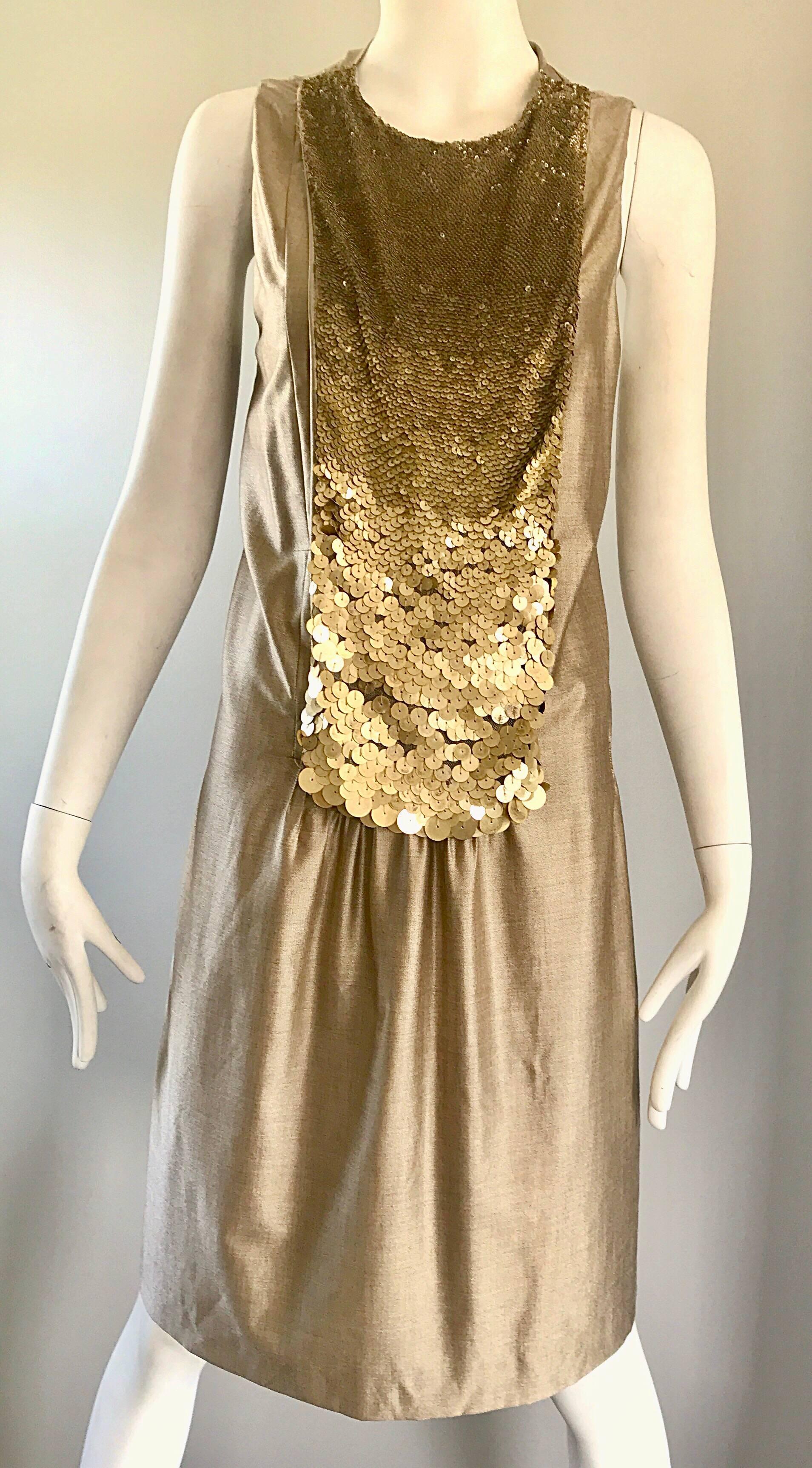 Brand new early 2000s vintage LUCA LUCA gold metallic 1920s style sequined bib collar shift dress! Features thousands of hand-sewn matte gold sequins on the attached bib on the front. Flattering shift style is perfect for an array of shapes and
