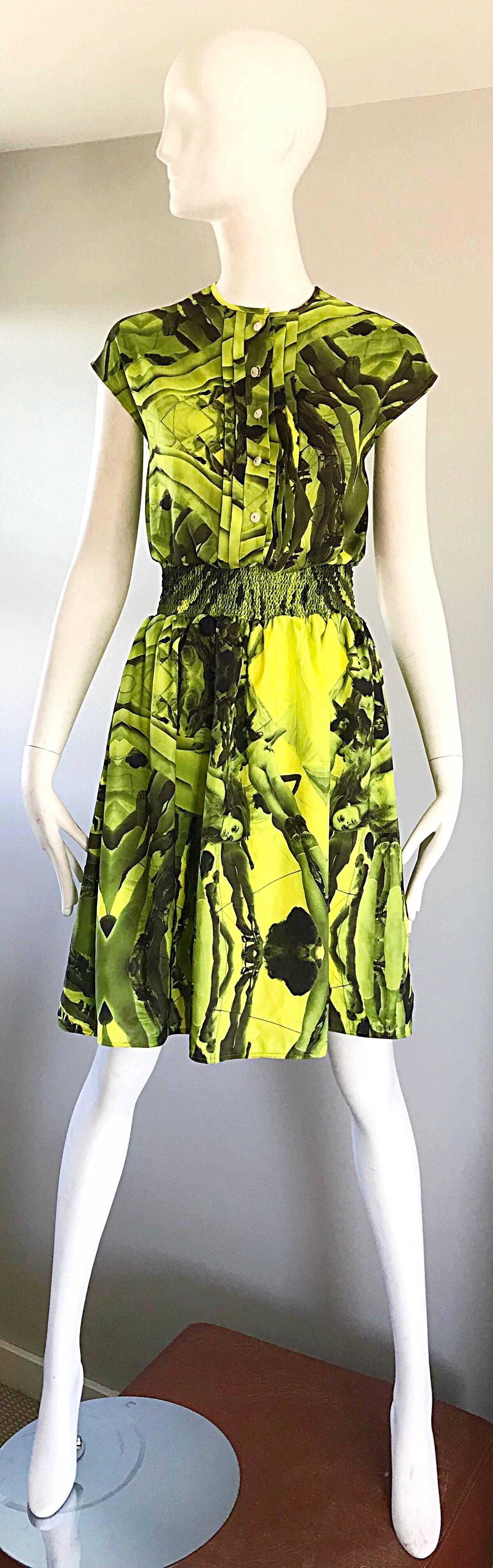 Incredible brand new with tags ASTIER neon yellow, grey and black novelty print silk dress! Features nude women in pantyhose and high heels throughout, mixed with abstract prints. Buttons up the front bodice. Elastic waistband at waist stretches to