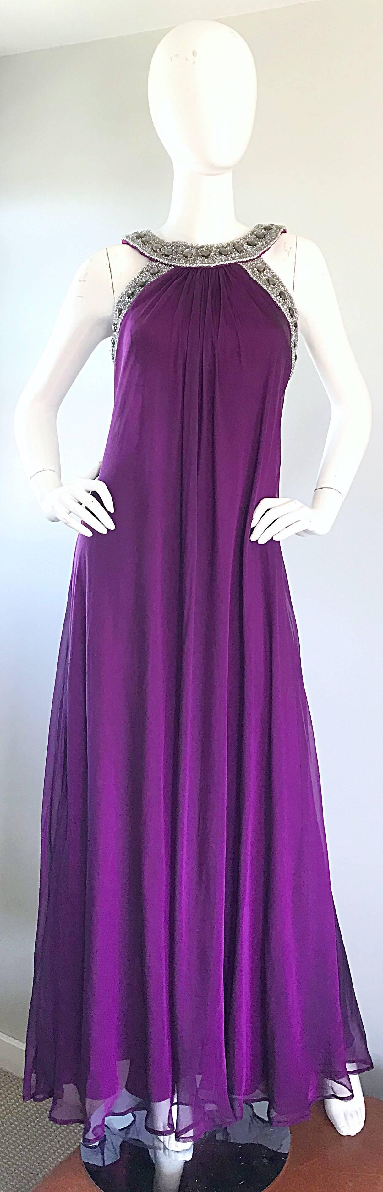 Stunning 90s BADGLEY MISCHKA purple silk chiffon Grecian inspired empire shaped evening dress! Features hundreds of hand-sewn rhinestones and silver beads along the neck and arms. Layers of luxurious silk chiffon look amazing on! Hidden zipper up