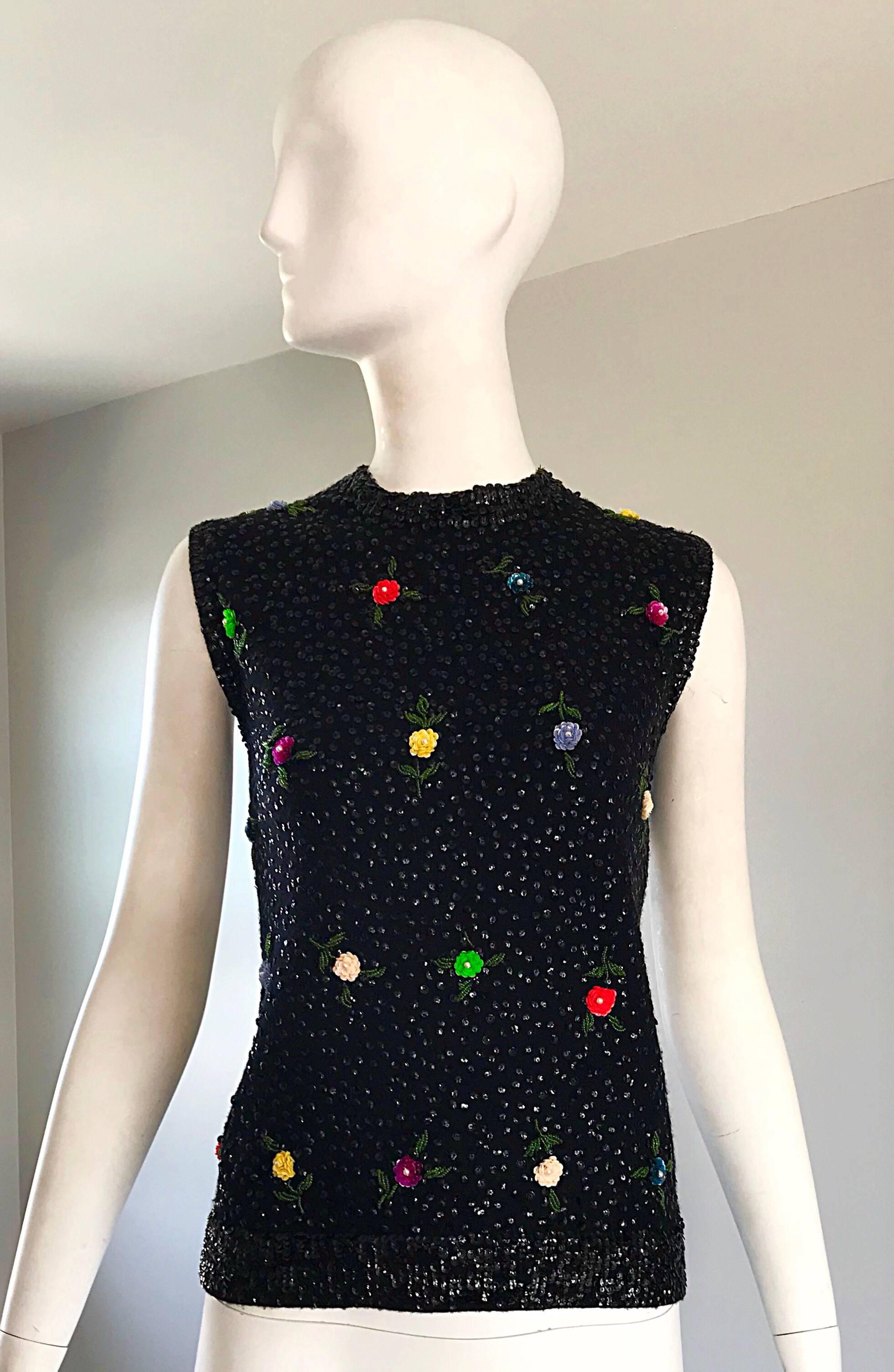 Beautiful 1950s black soft lambs wool and angora fully sequined sleeveless sweater! Features thousands of hand-sewn sequins throughout the entire piece. Brightly colored sequins sewn to look like little flowers in neon green, hot pink, yellow, red,