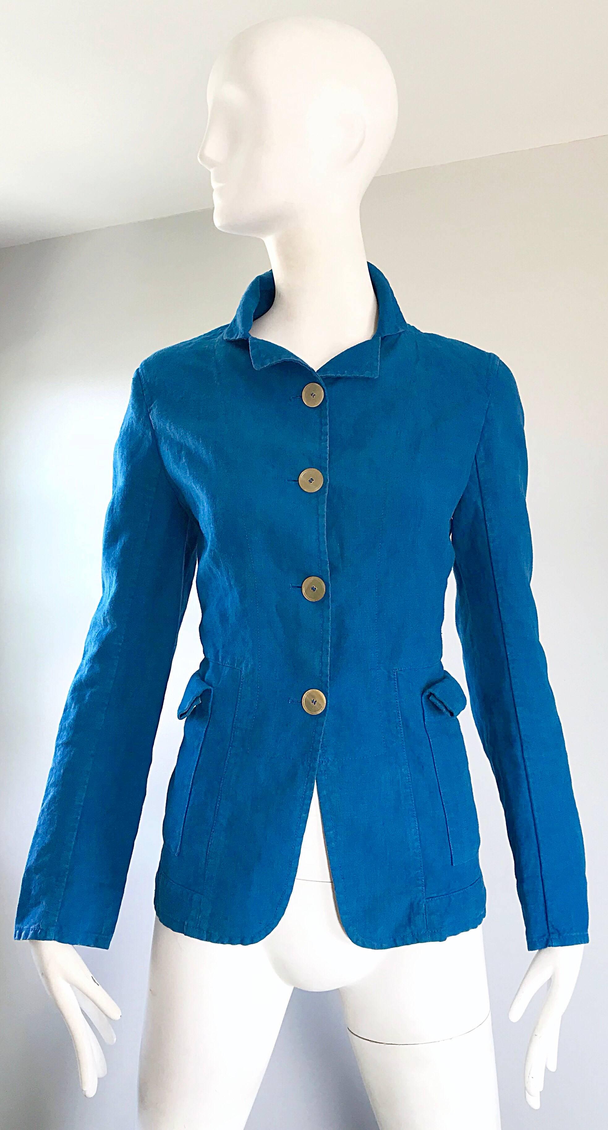 Wonderful 90s JIL SANDER turquoise blue fitted jacket! Smart tailored fit looks amazing on. Four ivory buttons up the front. Cargo pocket at each side of the hips Velcro shut. The perfect weight material for any time of year! Can easily be dressed