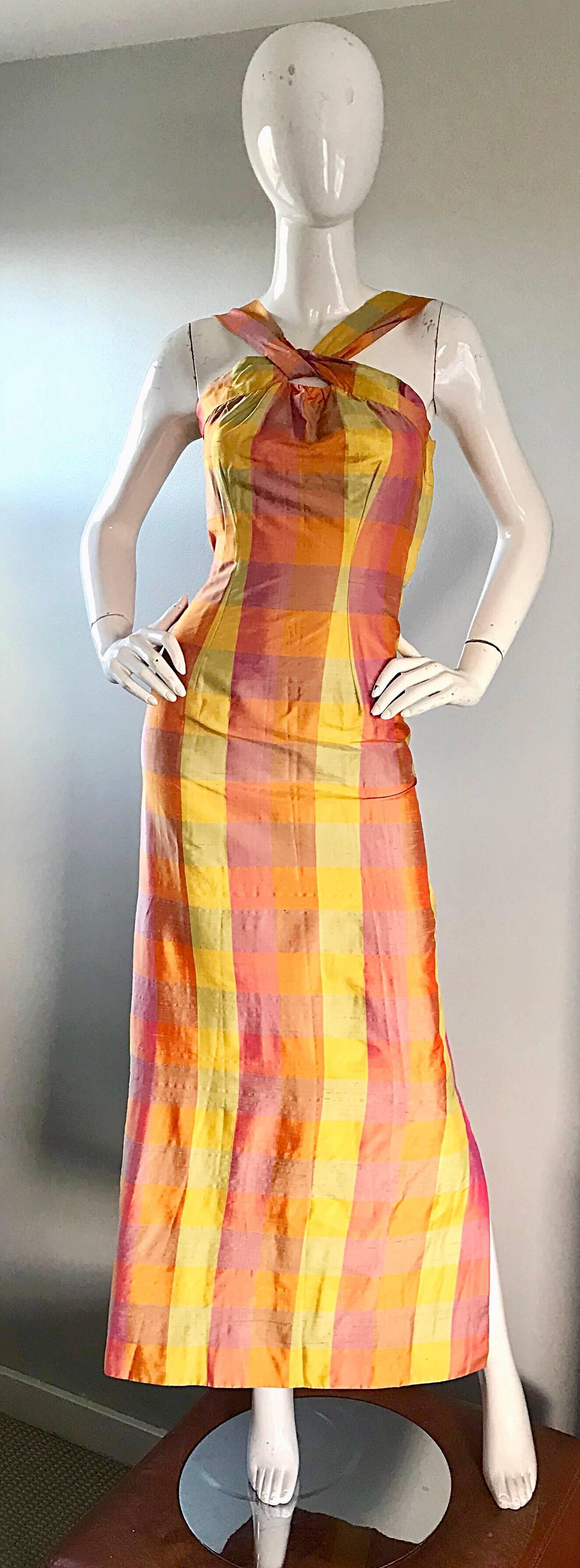 Gorgeous 1970s plaid silk shantung halter maxi dress! Pastel colors of yellow, orange and pink throughout. Keyhole (Peek-a-boo) above the bust. The perfect fitting dress, with an amazing print! Hidden metal zipper up the side with hook-and-eye
