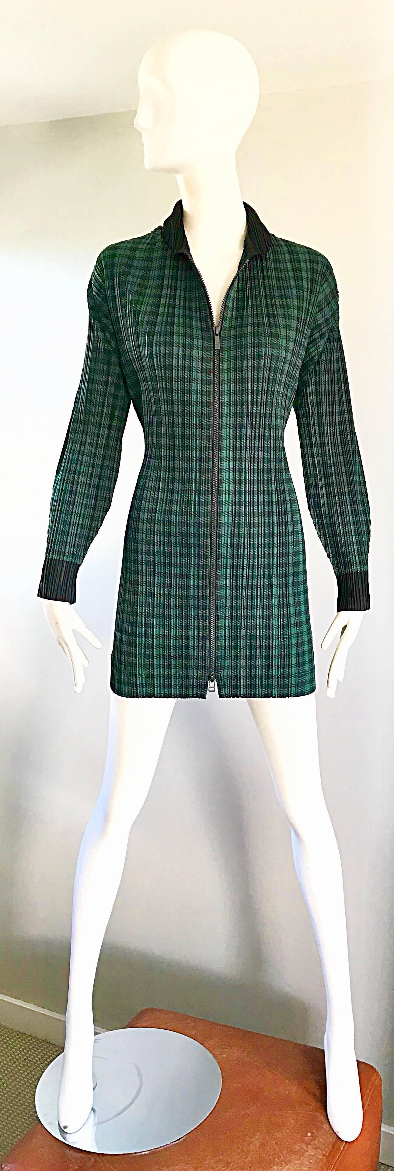 Amazing 1990s ISSEY MIYAKE PLEATS PLEASE larger size green and black checkered jacket OR mini dress! Features signature micro pleats that allow stretch to fit. Black zipper up the front. Can easily be worn as either a jacket or a dress. Great belted