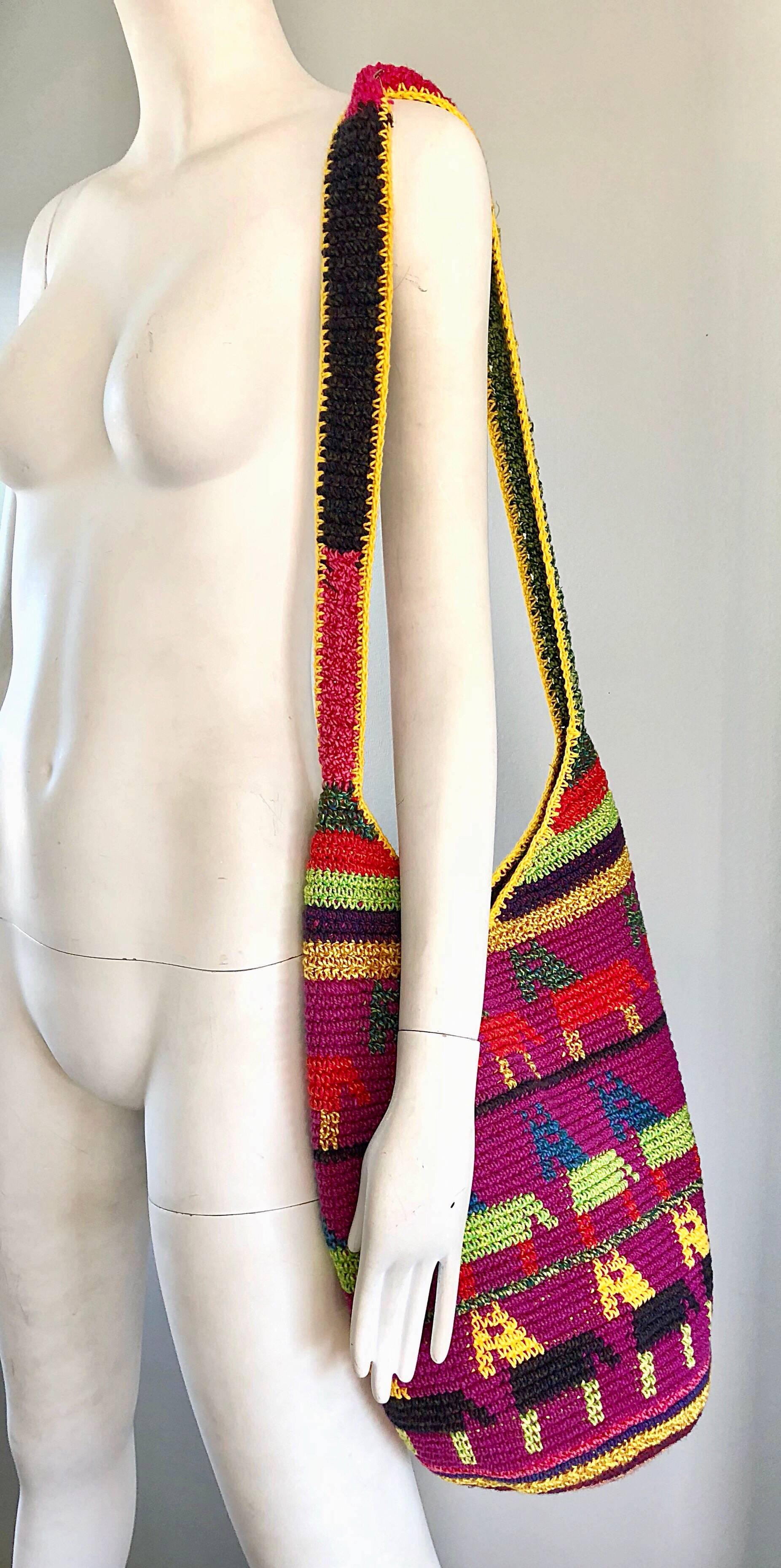 Amazing EXTRA LARGE hand crochet 70s vintage colorful boho shoulder bag, or crossbody / messenger bag! This beauty has it all, and appears to have never been worn! Zipper top makes this handbag perfect for traveling. Hand crochet, with bright colors