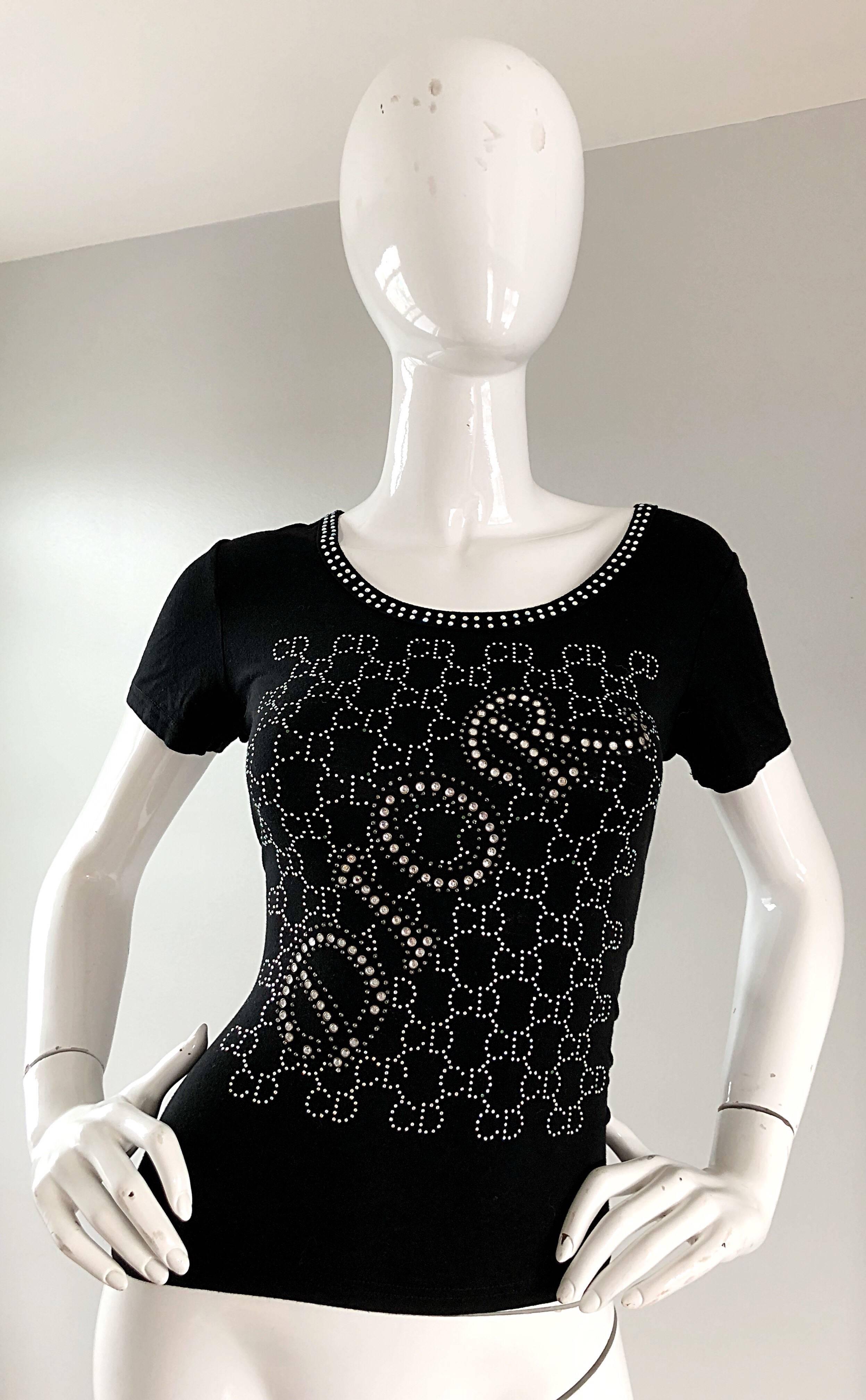 Fashionable vintage late 1990s CHRISTIAN DIOR by JOHN GALLIANO black rhinestone short sleeve logo top! Features hundreds of hand embossed silver rhinestones with the CD monogram throughout.  Soft stretch rayon. Diagonal DIOR spelt out in rhinestones