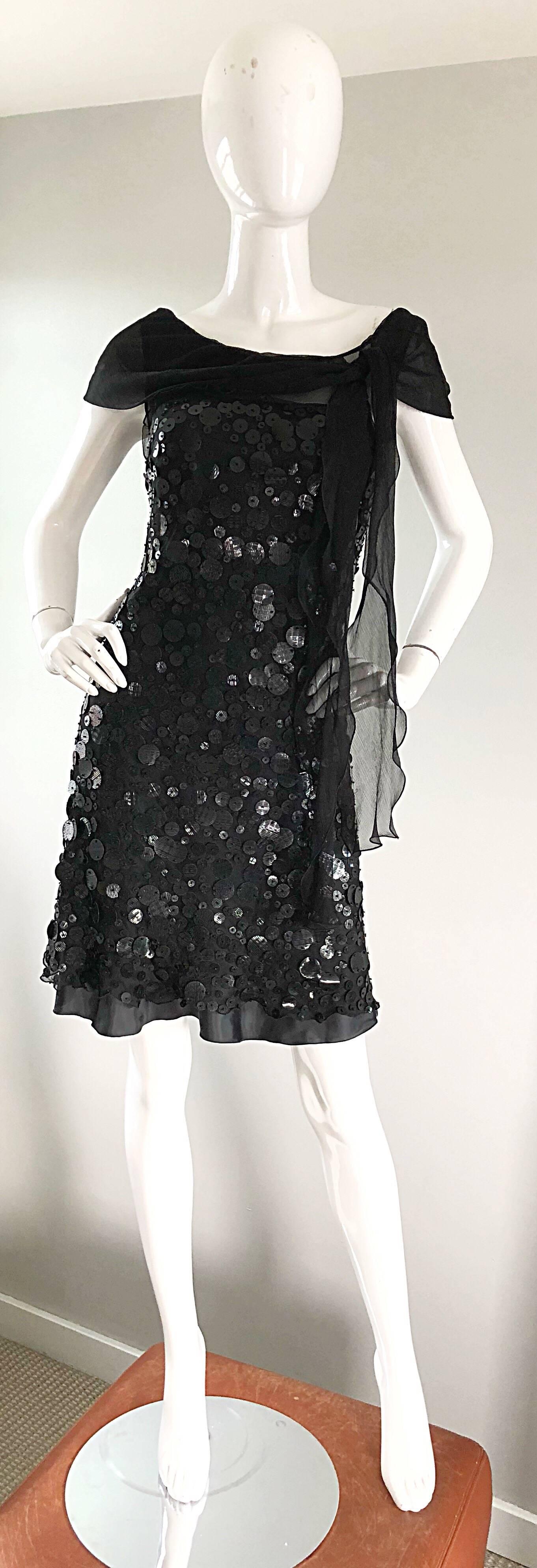 Super stylish never worn late 1990s / 90s MOSCHINO Cheap and Chic black silk chiffon dress! This beauty is embellshed with thousands of hand-sewn black iridescent paillettes in a variety of sizes throughout. Fitted bodice, with a forgiving flirty
