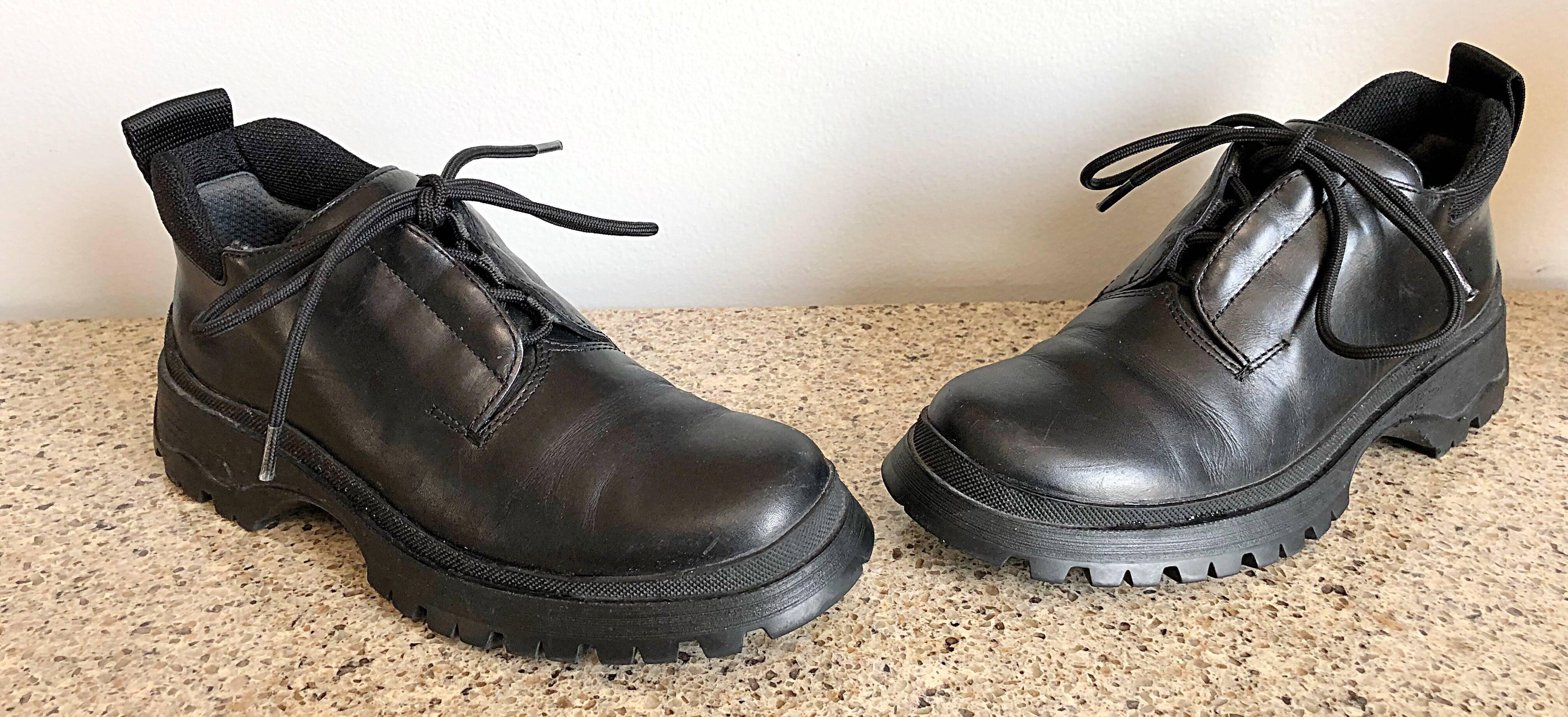 Women's New 1990s Prada Black Leather Size 37.5 / 7.5 Chunky Vintage Flat Ankle Boots For Sale