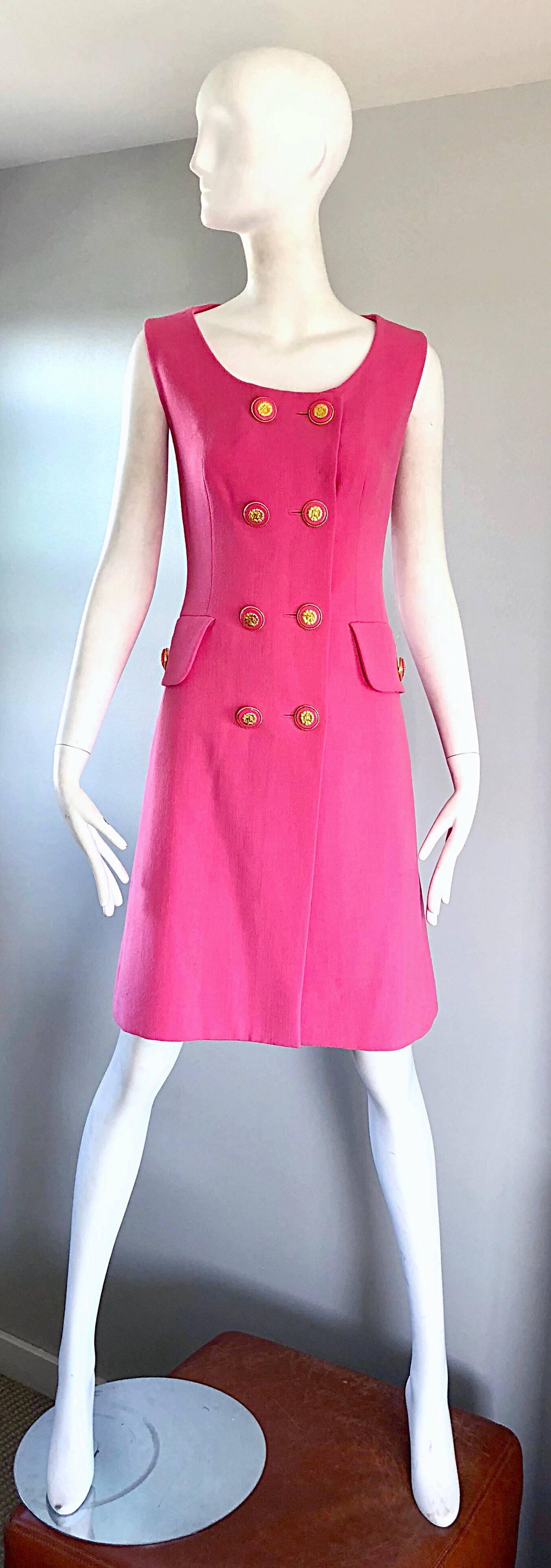 Chic 90s does 60s JACQUES FATH demi couture bubblegum pink virgin wool shift dress! Features a soft luxurious wool that is lined with silk. Double breasted style, with signature JF embossed pink and gold buttons. Buttons up the front, with extra