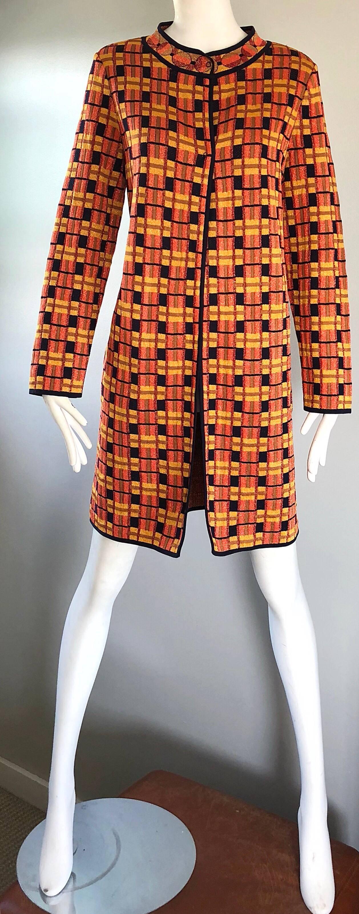 Chic 90s does 60s MISSONI burnt orange, yellow, brown and black metallic knee length knit vintage cardigan jacket! Mod 1960s style, with a modern update. Features pockets at each side of the hips. Slight metallic sheen gives off just the right