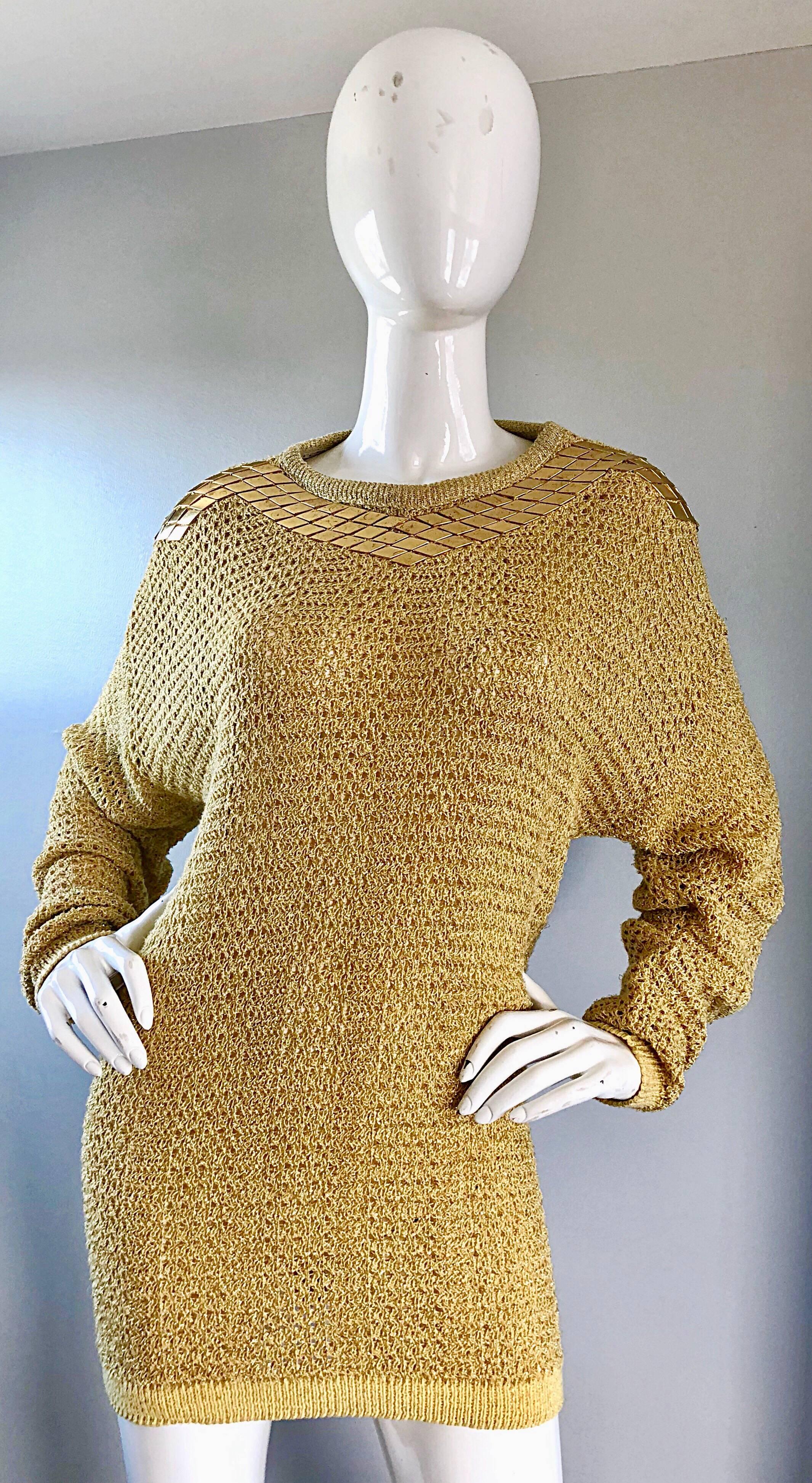 Chic 1980s MARSHALL ROUSSO of LAS VEGAS gold metallic slouchy oversized sweater top! Features a soft gold metallic open weave fabric, with gold metal flat studs on the front and back neckline. Flattering and forgiving dolman sleeves. Slouchy fit can