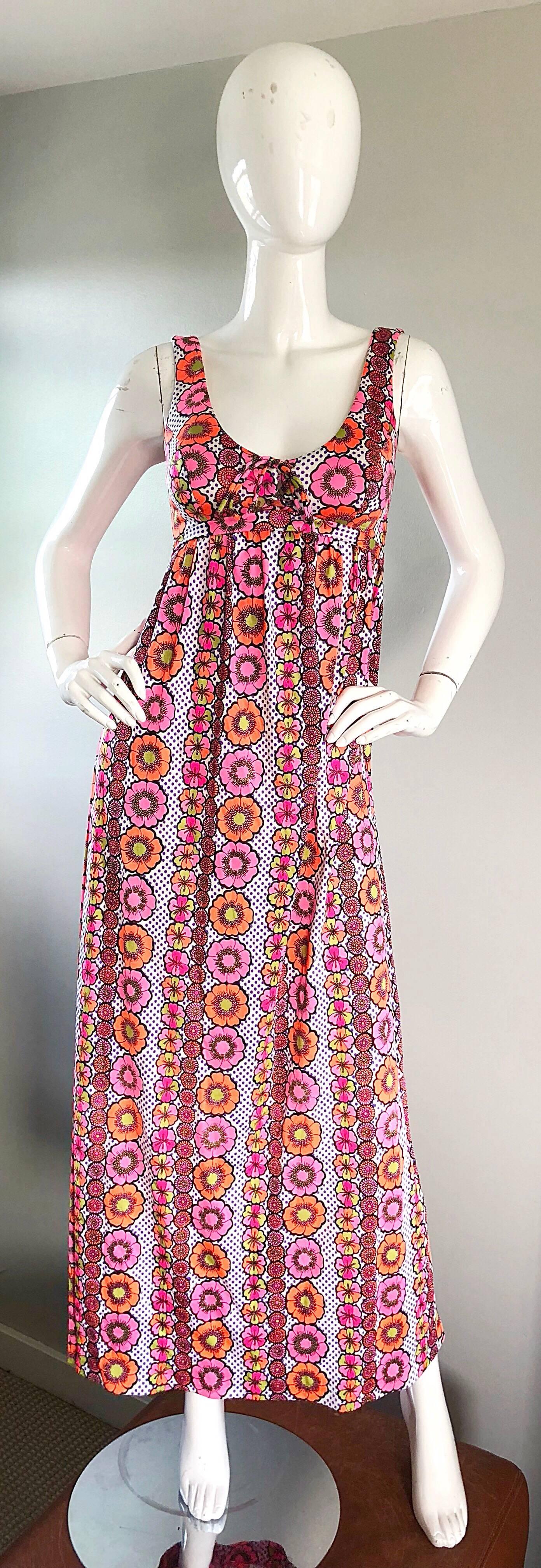 Awesome vintage SIRENA OF CALIFORNIA hot pink, orange, fuchsia, yellow, purple and navy blue boho maxi dress! Features a lace-up bodice that can adjust to fit an array of bust sizes. Hibiscus flower prints, mixed with purple and white polka dots.