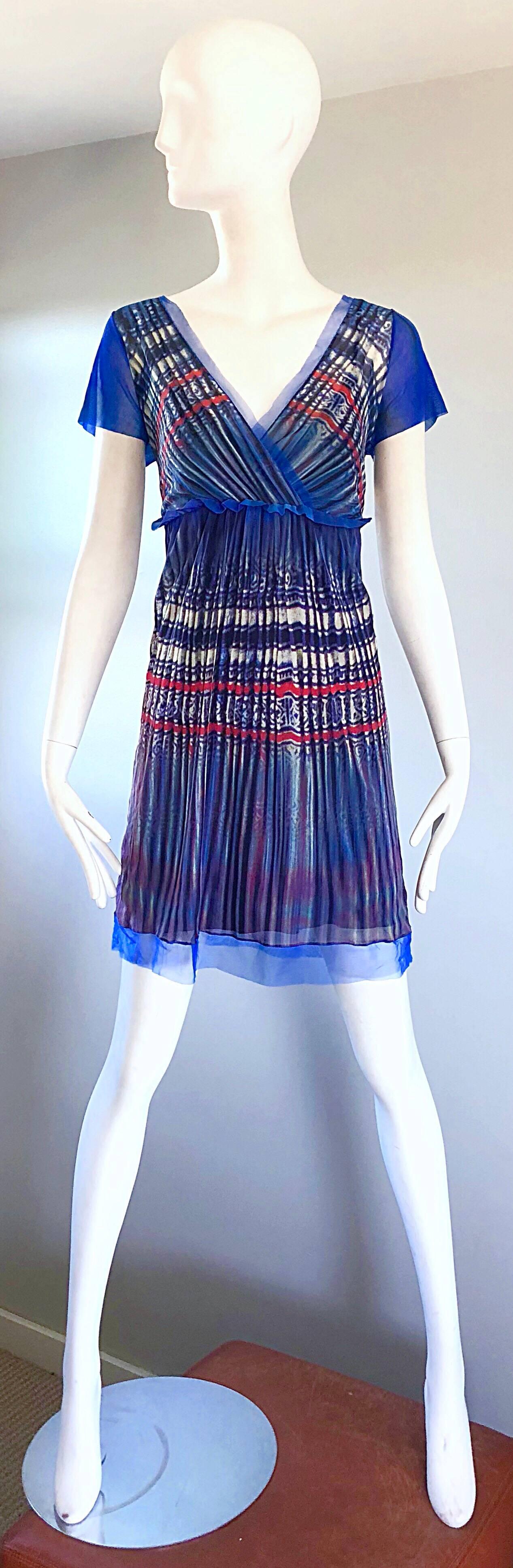 Amazing early 90s VIVIENNE TAM empire waist dress and slip set! Features a vibrant blue, white, red, pink, and green. Dress is signature mesh. Slip is blue jersey that stretches to fit. Semi sheer short sleeves. Ruffle at the waist. Simply slips