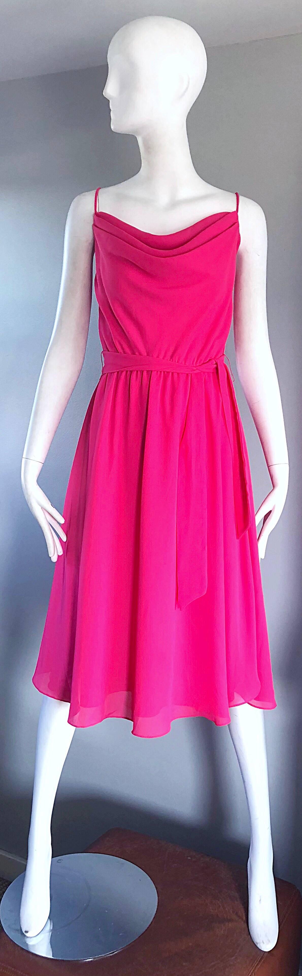 Gorgeous vintage 70s PHILLIPE JODUR for FERRALI schocking hot pink sleeveless crepe disco dress! Features a fitted draped Grecian style bodice. Flirty full skirt, with a detachable tie belt. Simply slips over the head, and stretches to fit. Features