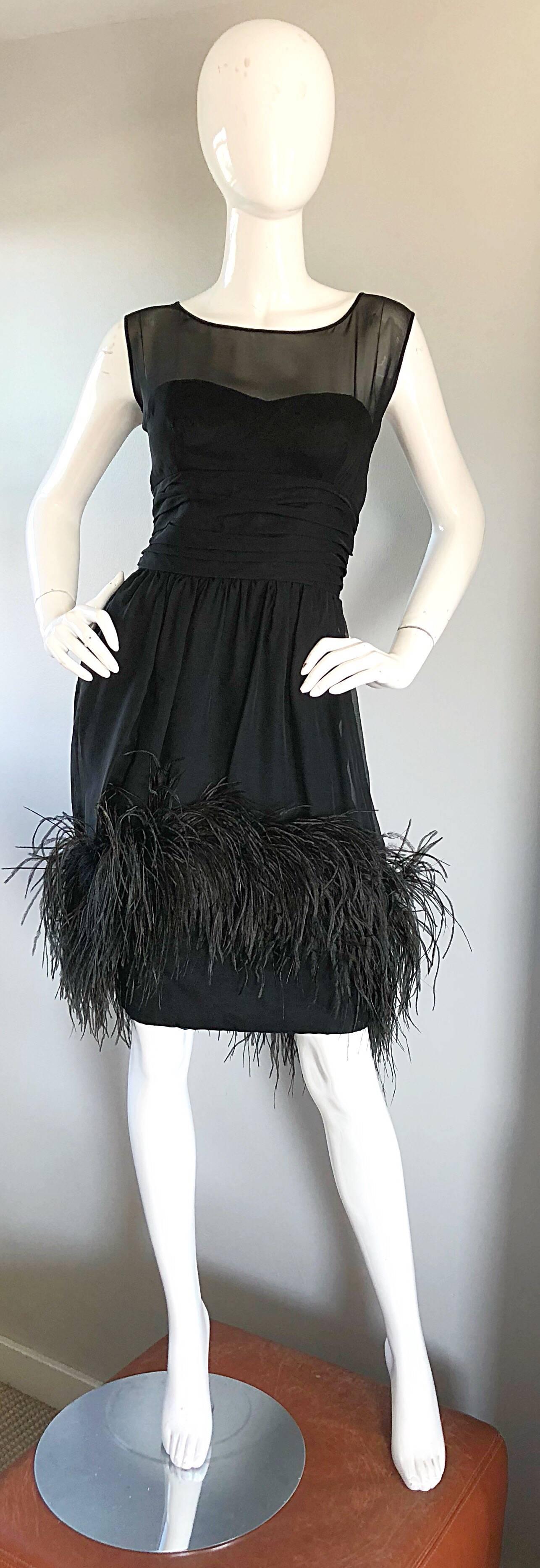 Gorgeous and rare 1950s FERMAN O'GRADY black silk chiffon and crepe nude illusion demi couture cocktail dress! Features a fitted taffeta strapless boned bodice with a semi sheer black chiffon overlay. Crepe skirt features the same black silk chiffon