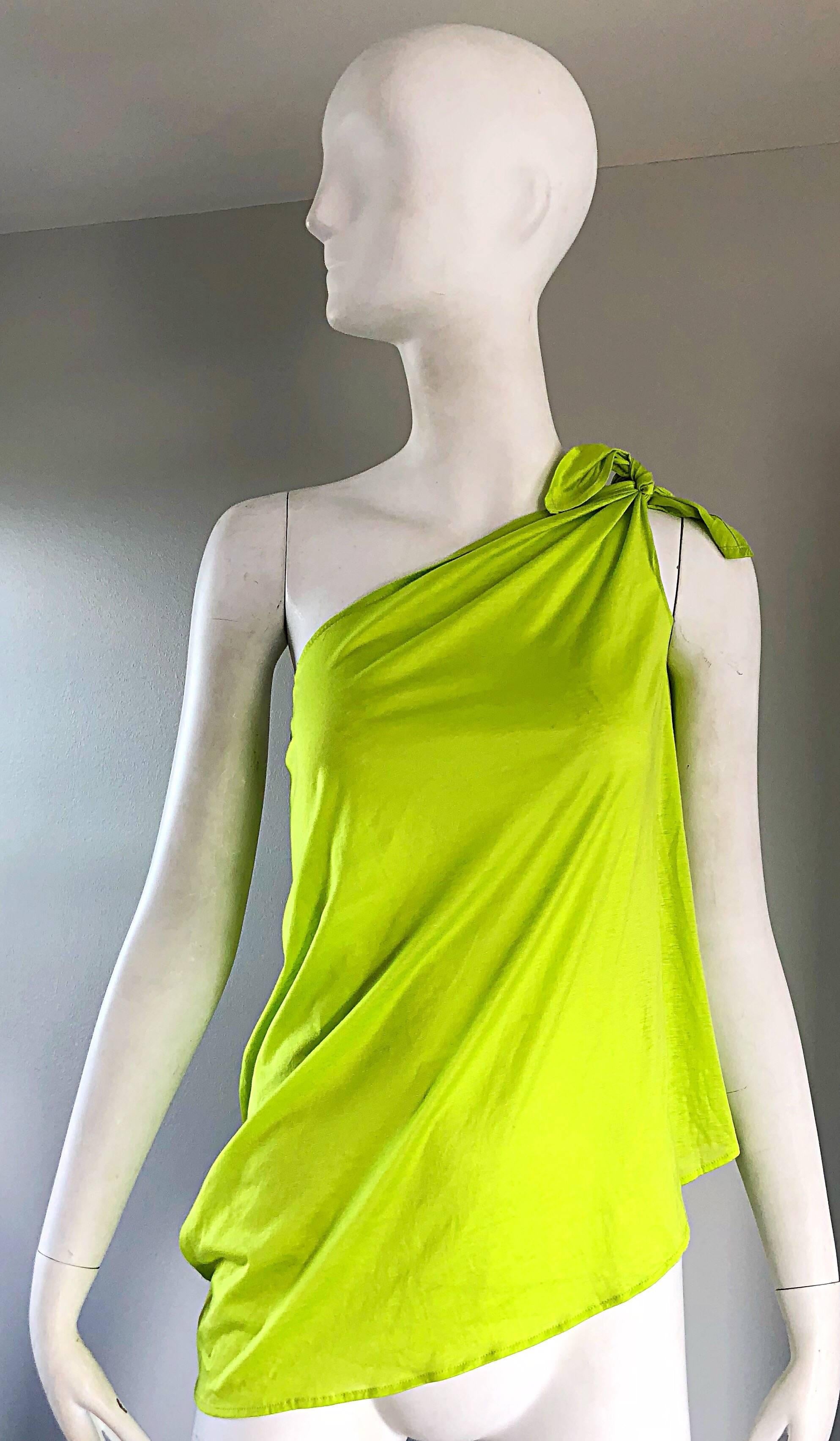 Chic vintage 90s ERES one shoulder lime neon green one shoulder lightweight top! Simply ties at the left shoulder to control size. Lightweight breezy cotton fabric looks great alone orbelted. Pair with shorts, pants jeans, or a skirt. In great