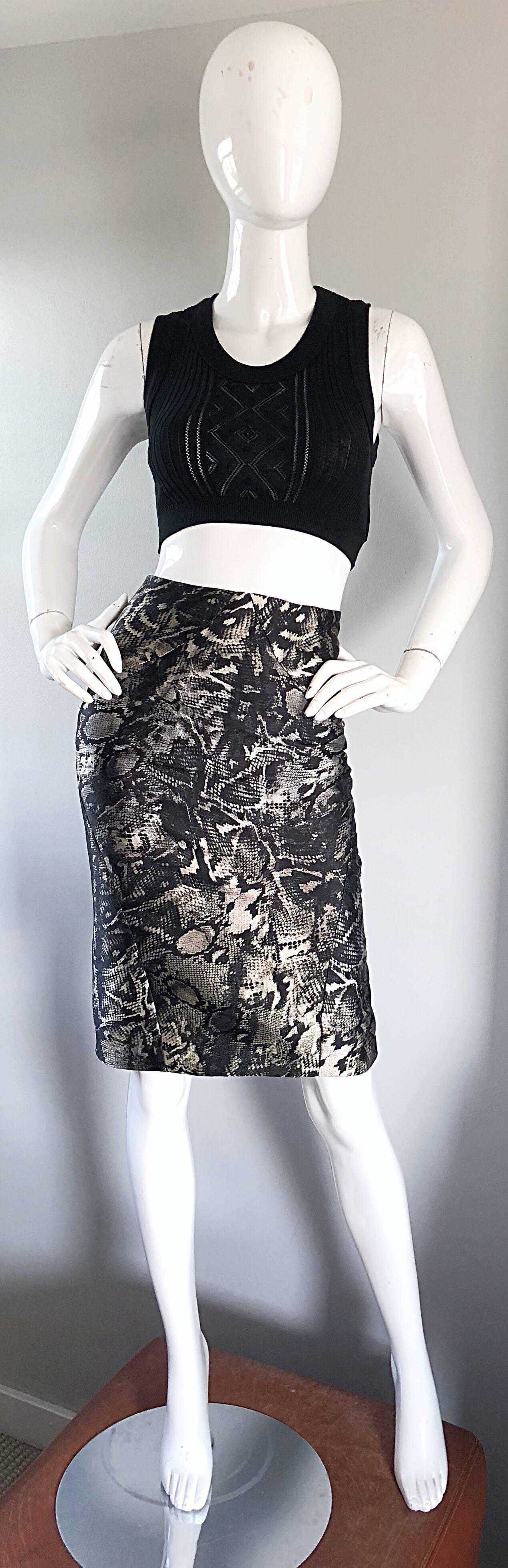 Sexy and chic brand new early 2000s ZAC POSEN $1,275 skirt! Features a flattering high waisted pencil fit, with a flounce hem in the back. Classic, yet edgy abstract snake skin print in silver, black and white. Flattering high waisted fit. Fitted