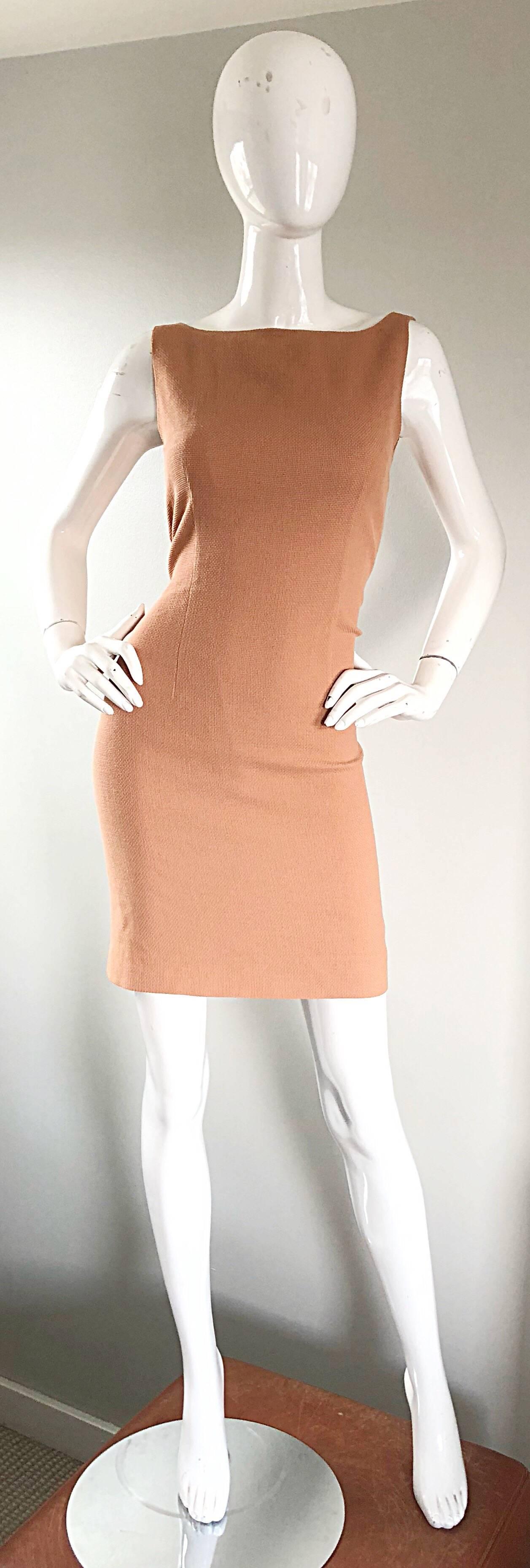 Chic and classic never worn 1990s LUCA LUCA terra-cotta virgin wool sleeveless sheath dress! The perfect alternative to the little black dress, this gem offers so much versatility. Fine textured virgin wool, with nude silk chiffon lining. Hidden