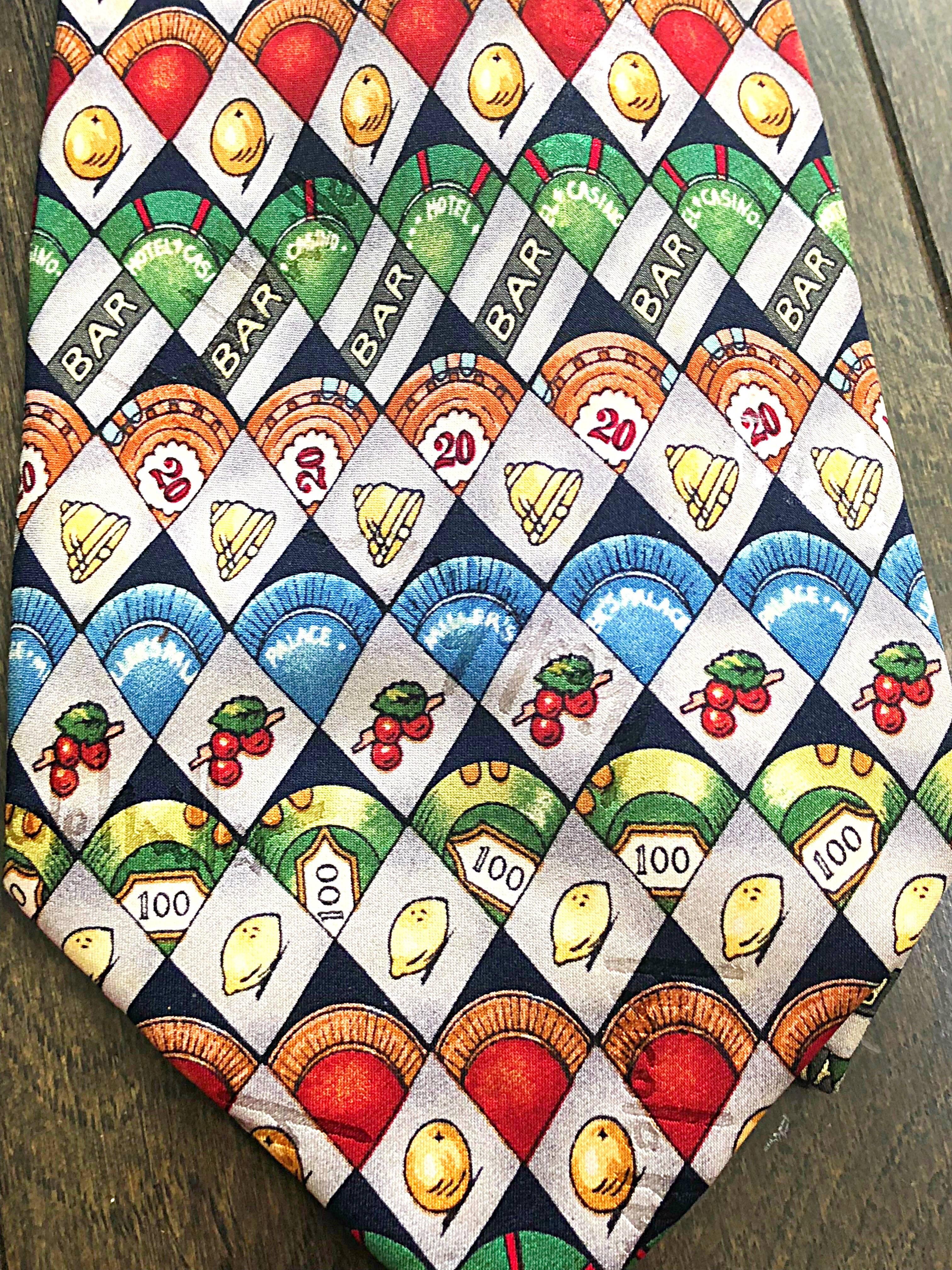 Limited edition never worn men's 1990s NICOLE MILLER 'slot machine' novelty print silk necktie! Features vibrant colored slot machine prints throughout. Perfect for a gift! In great unworn condition.