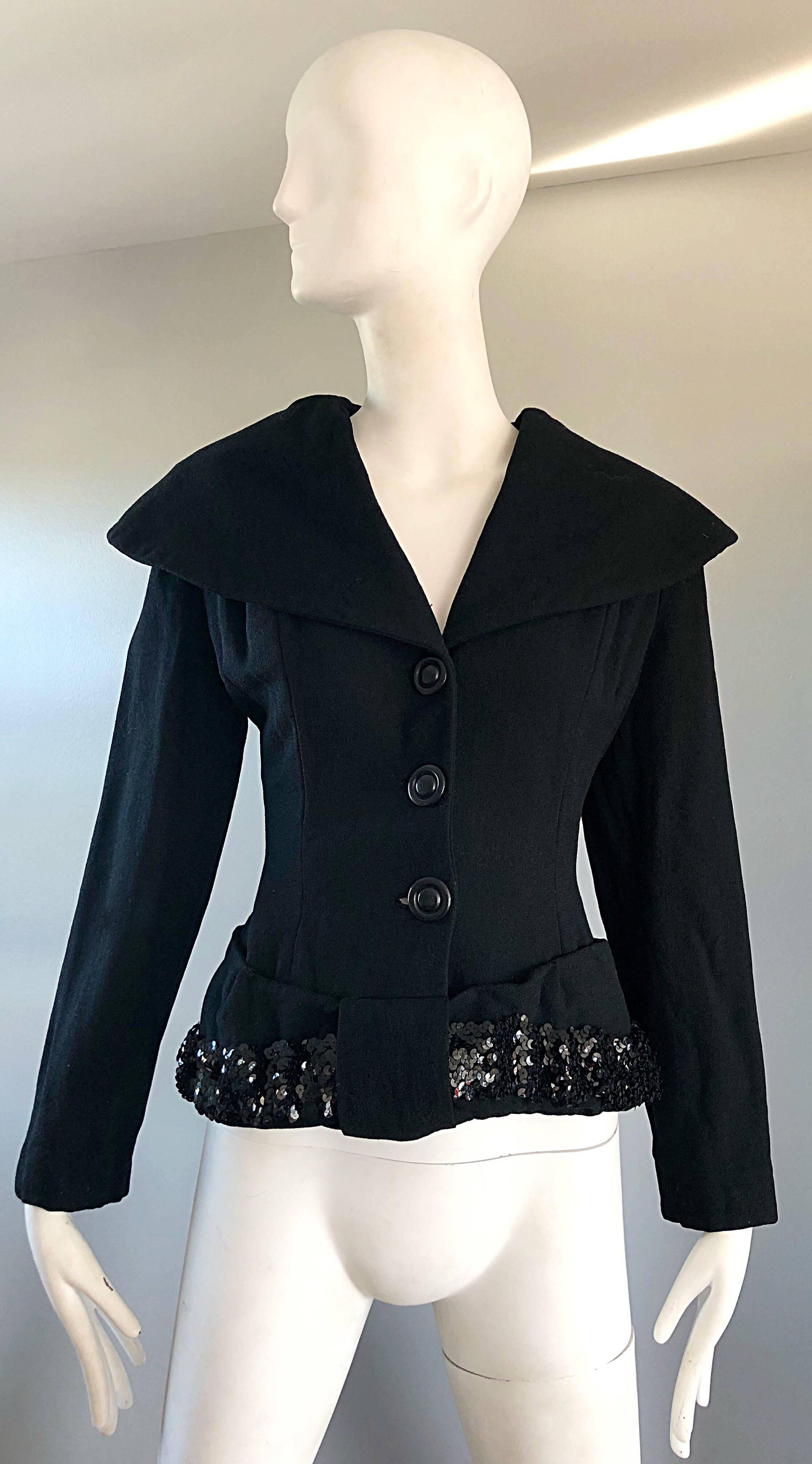 Gorgeous 1940s LILLI ANN black wool and sequined jacket! Features a dramatic portrait collar, with a smart chic tailored fit. Hundreds of hand-sewn black sequins at the trim. Buttons up the front bodice, with hidden snap details at the hem to ensure