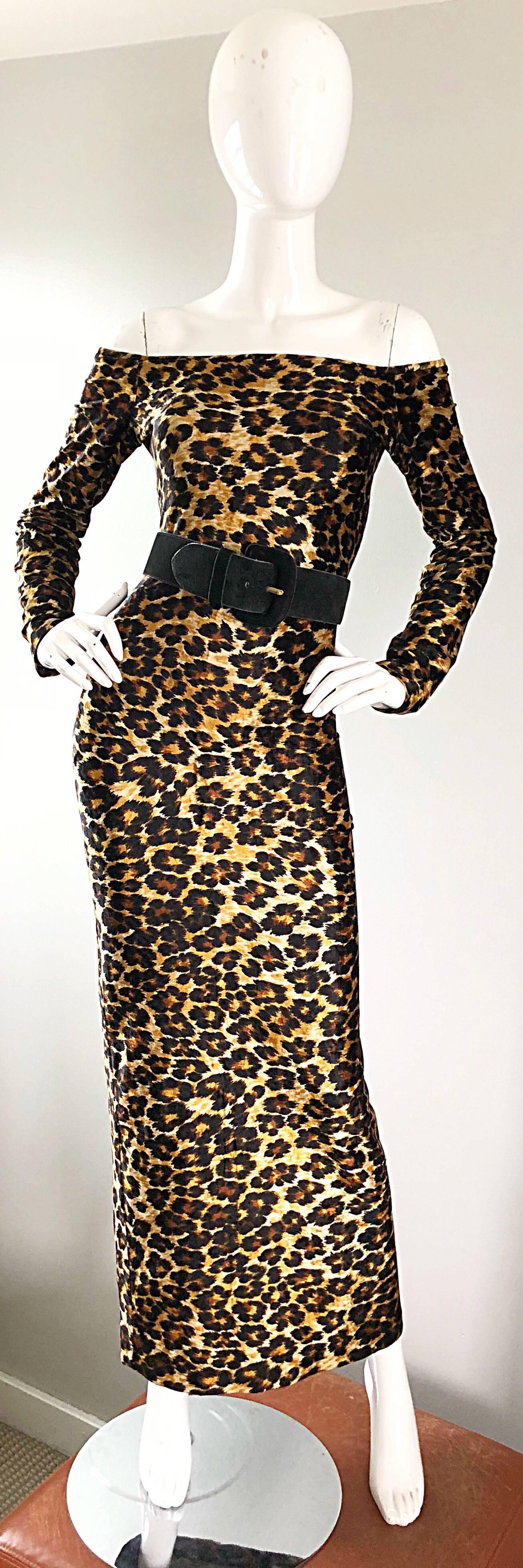 Sexy vintage 1980s leopard print gown by legendary designer, PATRICK KELLY! Classic cheetah print, with a body hugging velour jersey. One sleeve could easily be tucked in for a one-shoulder look. Hidden zipper up the side with hook-and-eye closure.