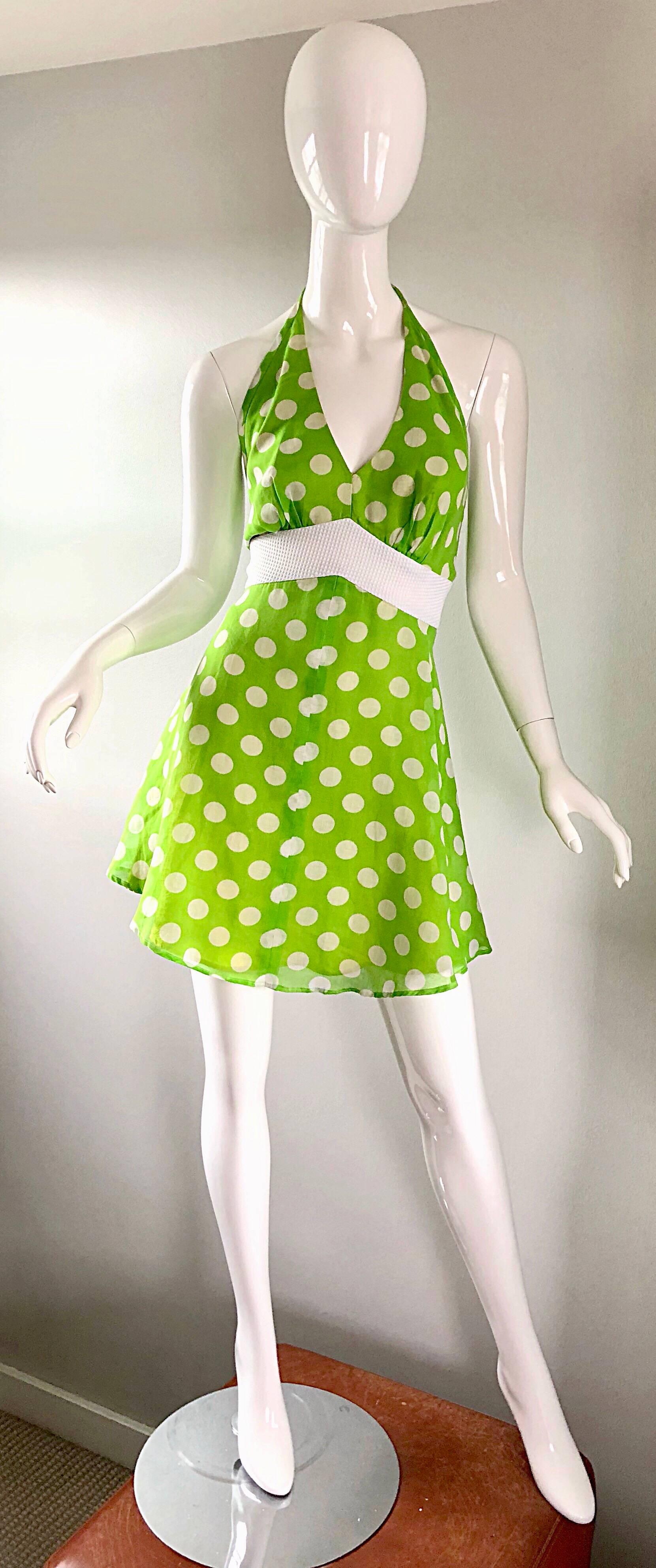 Sexy early 1990s neon / lime green and white lightweight cotton voile halter mini A Line dress! Features a lightweight double layer cotton voile fabric. Fitted bodice, with a forgiving A-Line skirt. Adjustable ties at back neck, and a hidden zipper