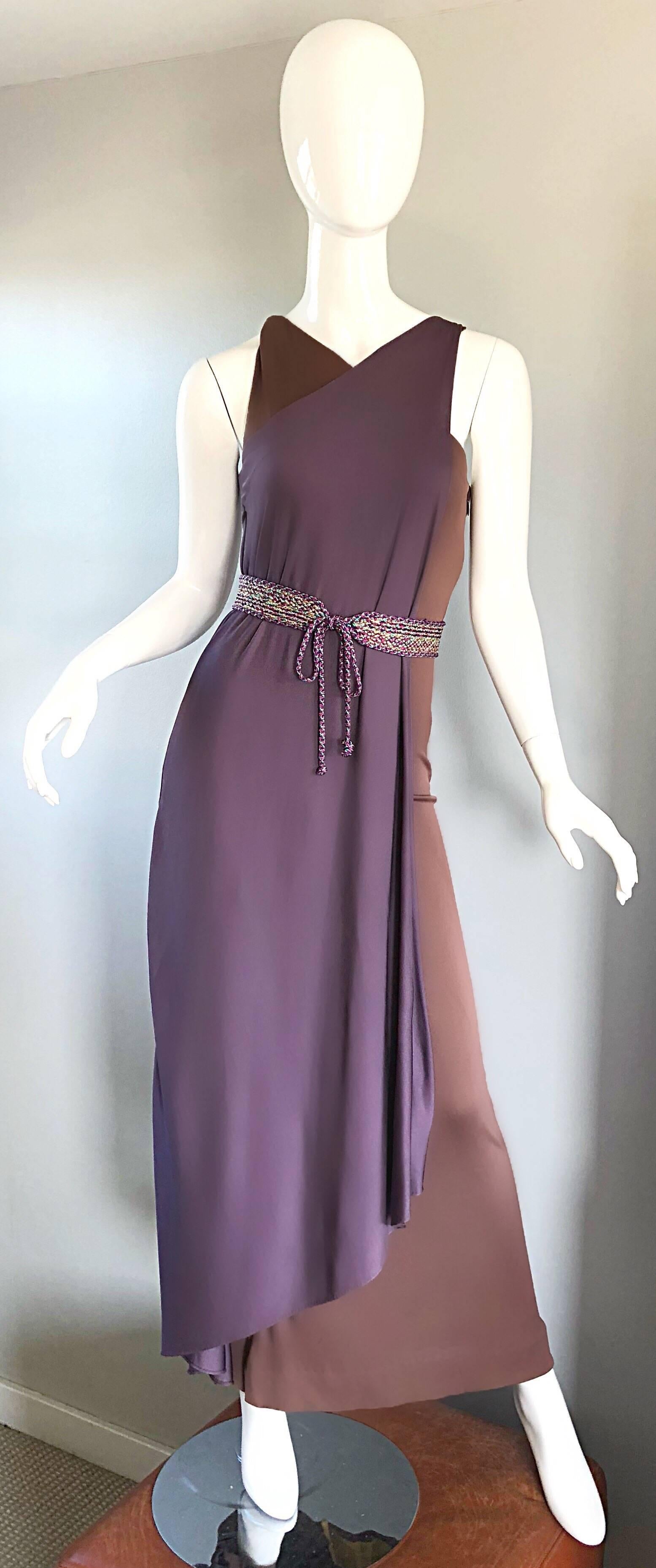 Gorgeous 70s BILL BLASS purple and brown silk jersey Avant Garde Grecian inspired color block belted evening dress! Slinky silk jersey fabric hugs the body in all the right places, and allows for plenty of stretch. Brown body, with a purple overlay.