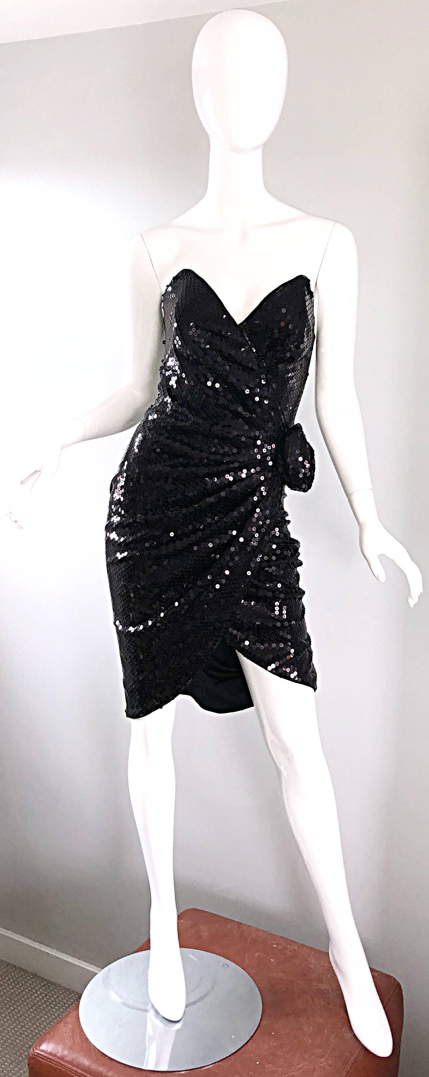 Sexy Avant Garde 1980s TADASHI SHOJI black sequin strapless mini dress! Words cannot even begin to describe how figure flattering this 80s gem is! Features thousands of hand-sewn black sequins throughout the entire dress, with so much detail. Raised