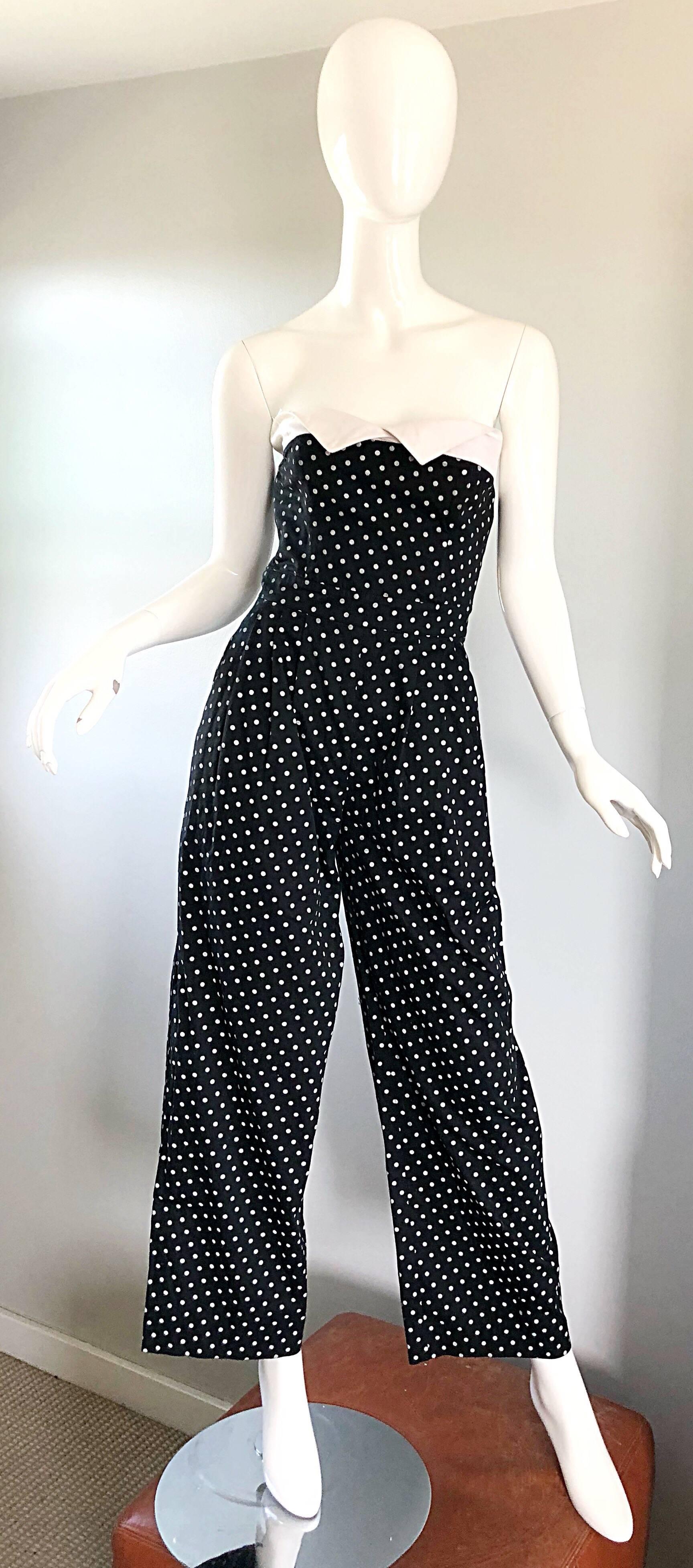 Incredibly chic vintage late 80s ESCADA by MARGARETHA LEY black and white polka dot strapless nautical cotton jumpsuit! Fitted bodice with flattering wide legs. Pockets at each side of the hips. White fold over above the bust. Hidden zipper up the