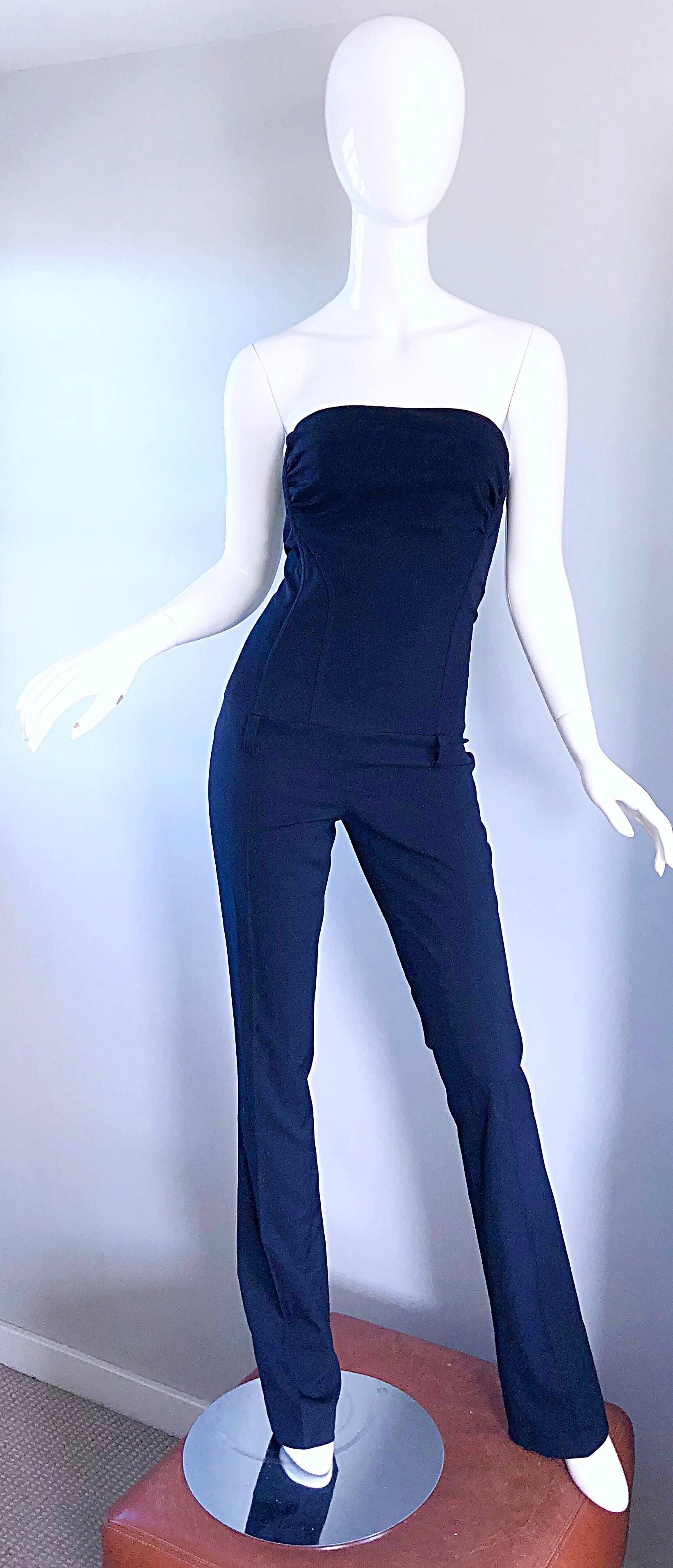 Fantastic early 2000s ELISABETTA FRANCHI Per CELYN B. Navy blue strapless jumpsuit! Features a soft virgin wool and rayon blend that allows for just the right amount of stretch and comfort. Boned bodice keeps everything in place. Pant legs are