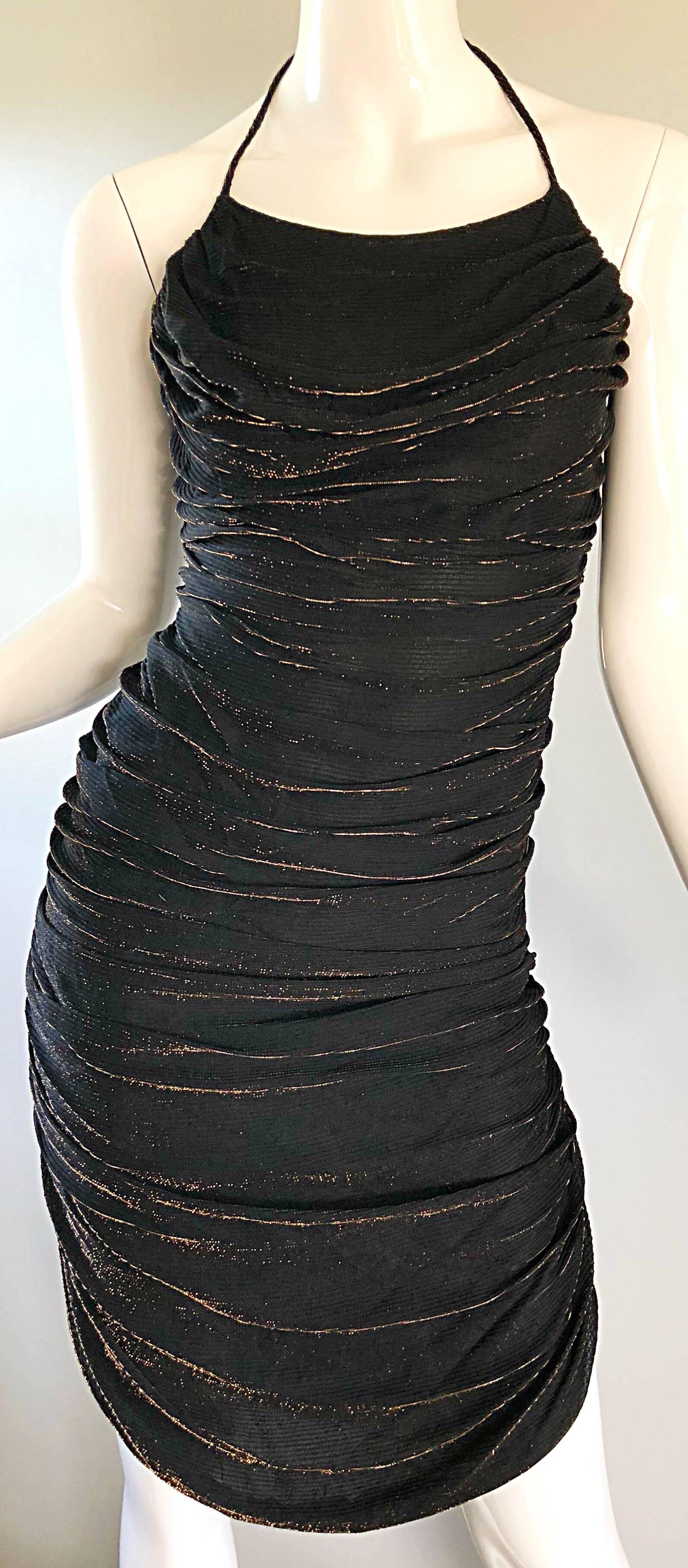 Sexy 1970s SAMIR black and bronze metallic ruched halter dress! Features flattering ruching body that stretches to fit. Body hugging fit looks fantastic on! Hidden zipper up the side. Lots of attention to detail. Great Studio 54 disco party dress,