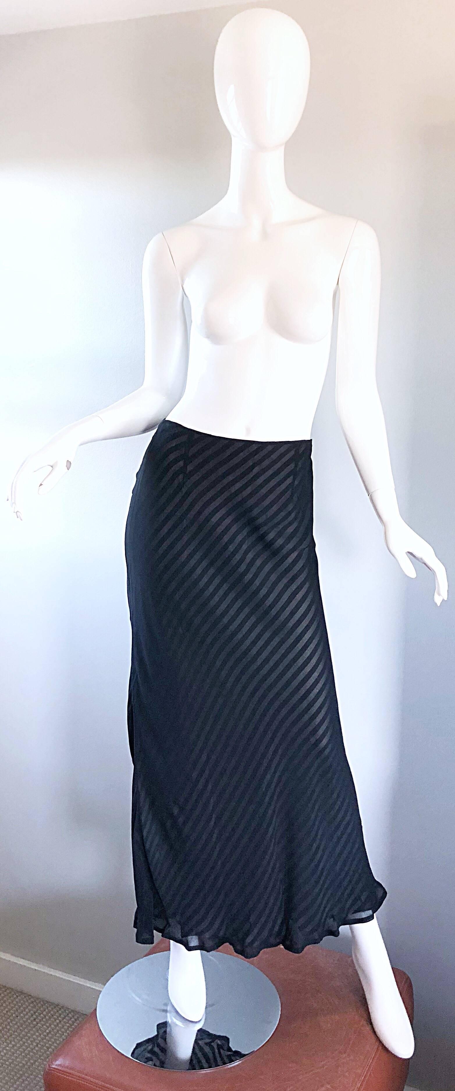 Exceptional 90s MOSCHINO CHEAP AND CHIC black and white striped maxi skirt! Features black and white diagonal striped rayon underskirt with a sheer black chiffon overlay. Hidden zipper up the side with hook-and-eye closure. Can easily be dressed up