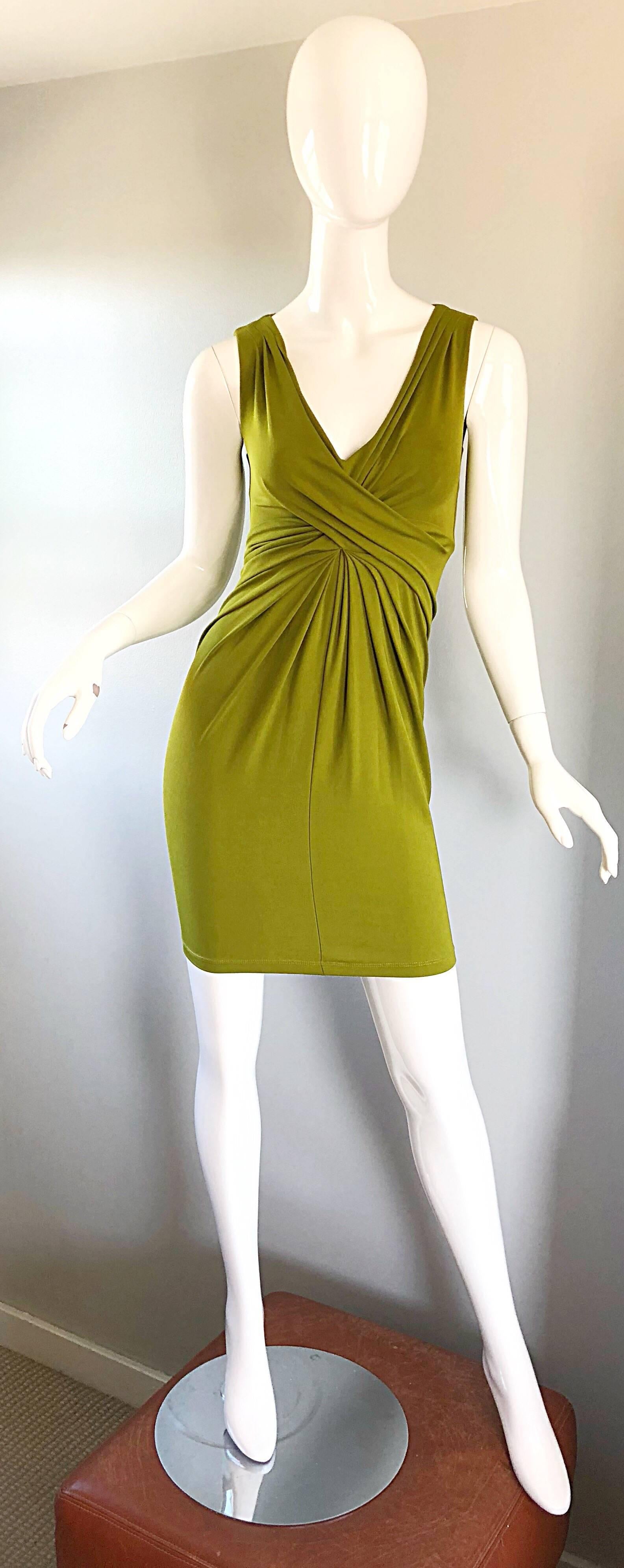 Beautiful early 2000s MICHAEL KORS COLLECTION chartreuse green silk jersey Grecian dress! Features a flattering silk jersey fabric that looks effortlessly chic on! Ruching hides any and all flaws. Hidden zipper up the side with hook-and-eye closure.