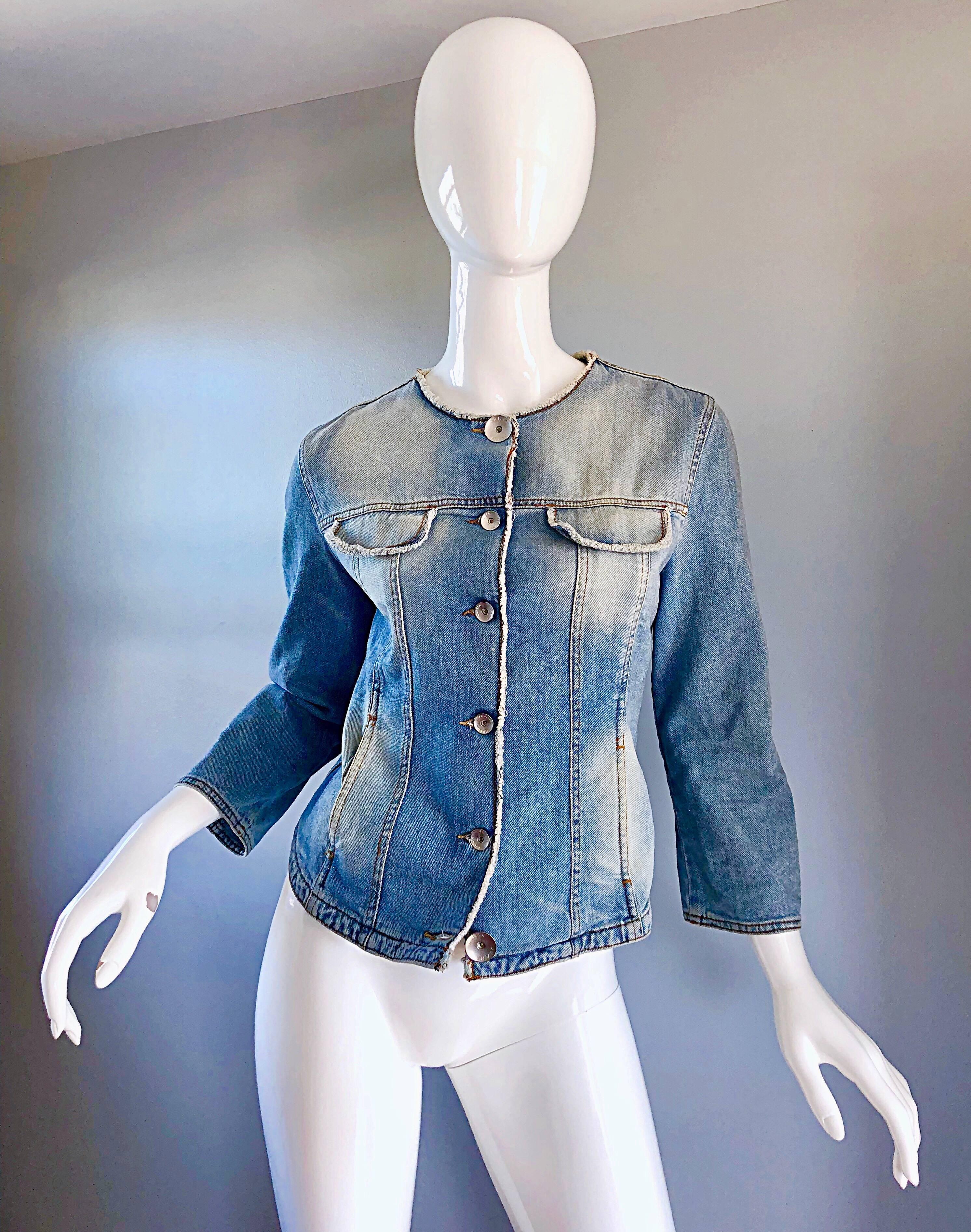 Amazingly chic vintage early 90s KRIZIA blue jean 'glitter' moto jacket! Features a light blue sandblasted denim, with an allover glitter coating (hard to see in photos, but amazing in person). Large matte silver nickel logo embossed buttons up the