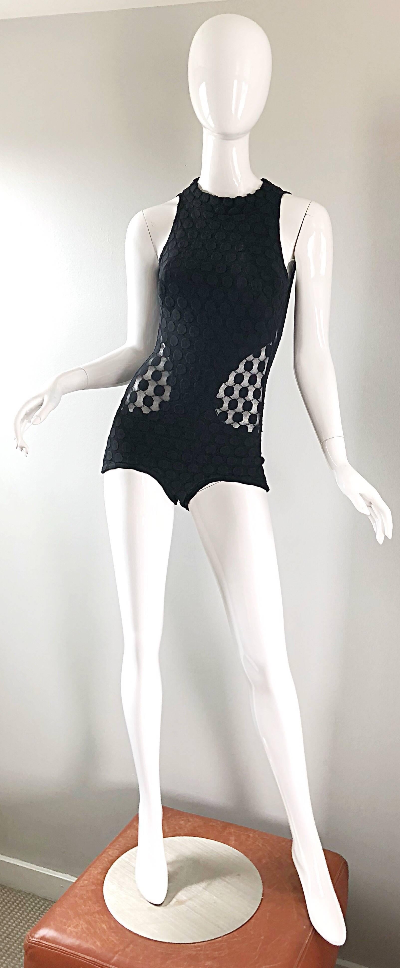 Sexy and rare 1960s GOTTEX black one piece swimsuit or bodysuit with sheer cut-out sides! Features a high neck with an open back. Black on black polka dot print. Semi sheer cut-outs at the side reveal just the right amount of skin. Large